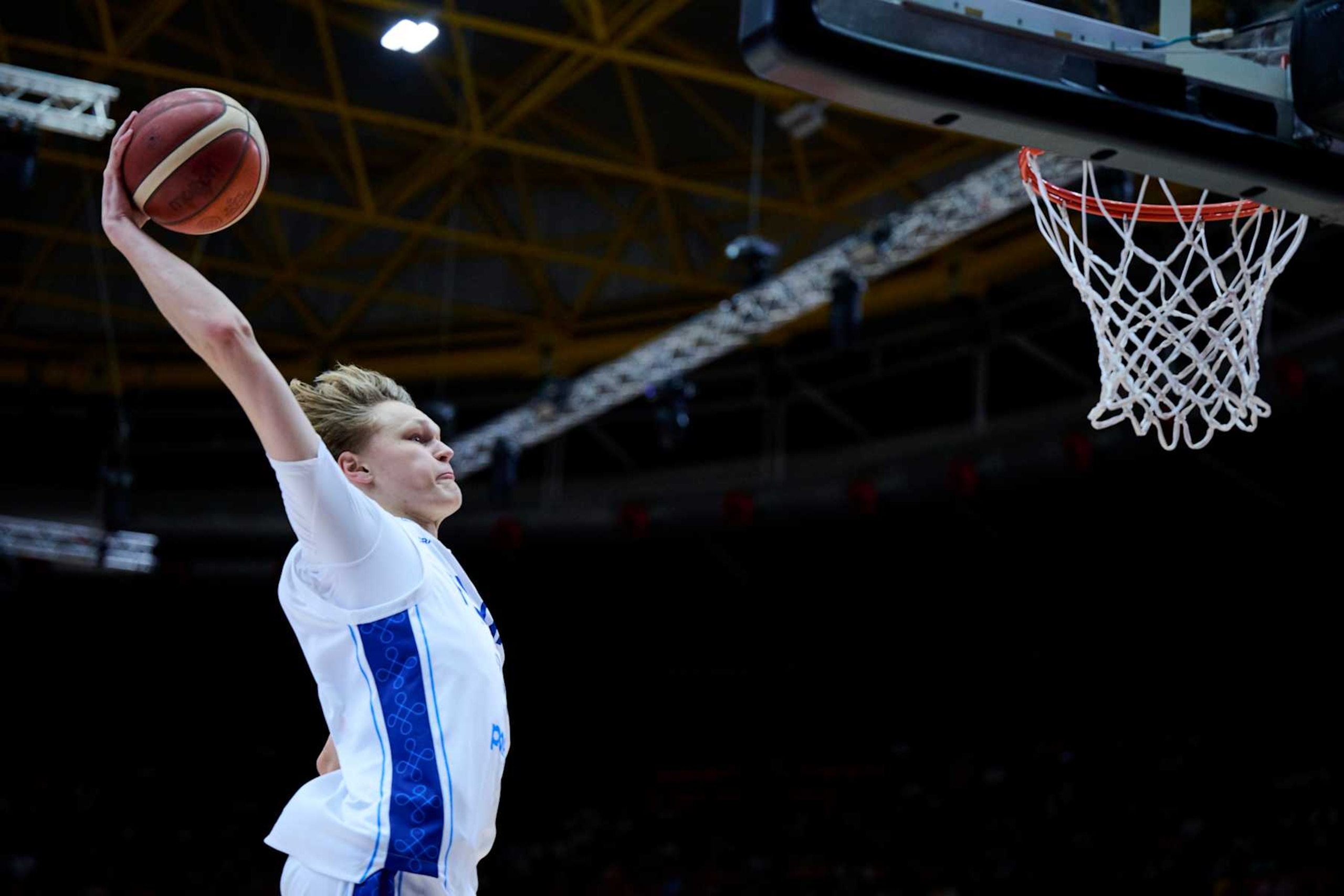 VALENCIA, SPAIN - JULY 06: Miikka Muurinen #24 of Finland dunks during Semi Finals of the Olympic Qualifying Tournament match between Finland and Spain at Pabellon Fuente de San Luis on July 06, 2024 in Valencia, Spain. (Photo by Borja B. Hojas/Getty Images)