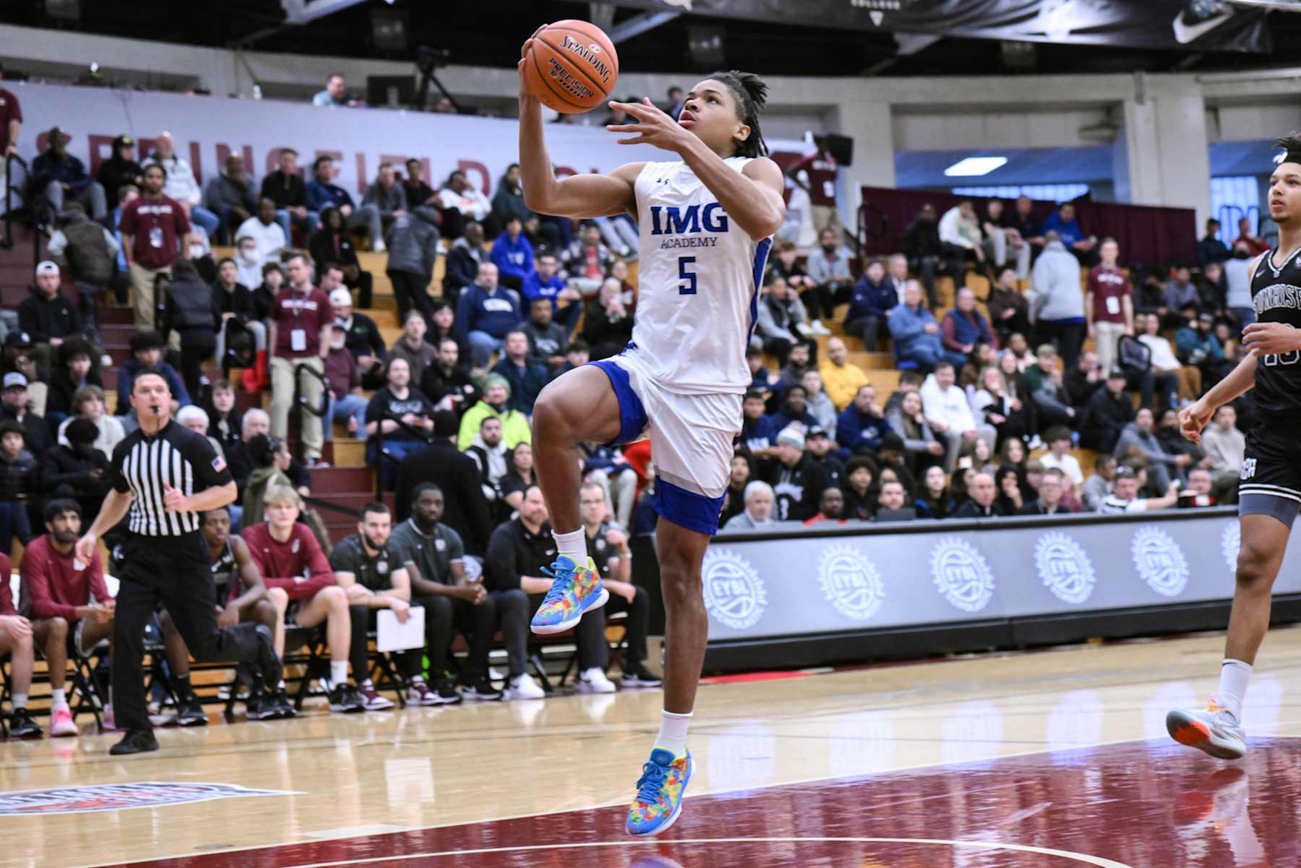 SPRINGFIELD, MA - JANUARY 14: Darius Acuff Jr. of IMG (5) drives to the basket during the first half of the Spalding Hoophall Classic high school basketball game between Sunrise Christian Academy and IMG Academy on January 14, 2024 at Blake Arena in Springfield, MA (Photo by John Jones/Icon Sportswire via Getty Images)
