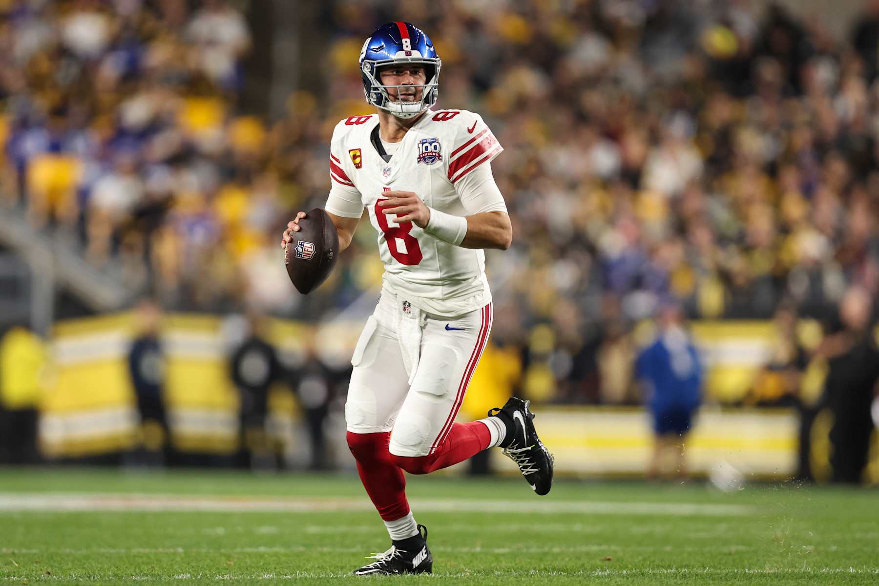 PITTSBURGH, PENNSYLVANIA - OCTOBER 28: Daniel Jones #8 of the New York Giants scrambles out of the pocket during an NFL football game against the Pittsburgh Steelers at Acrisure Stadium on October 28, 2024 in Pittsburgh, Pennsylvania. (Photo by Perry Knotts/Getty Images)