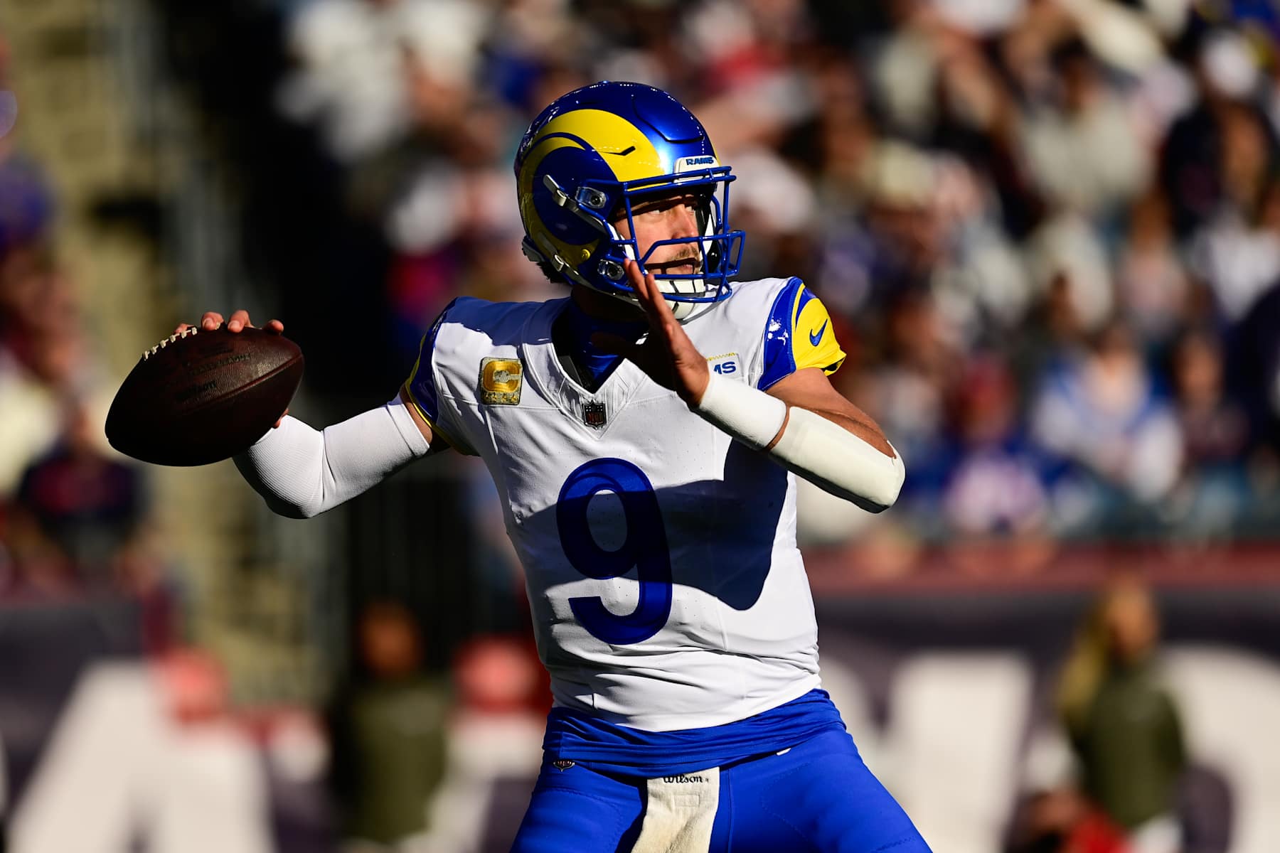 FOXBOROUGH, MASSACHUSETTS - NOVEMBER 17: Quarterback Matthew Stafford #9 of the Los Angeles Rams throws a pass during the first quarter against the New England Patriots at Gillette Stadium on November 17, 2024 in Foxborough, Massachusetts. (Photo by Billie Weiss/Getty Images)