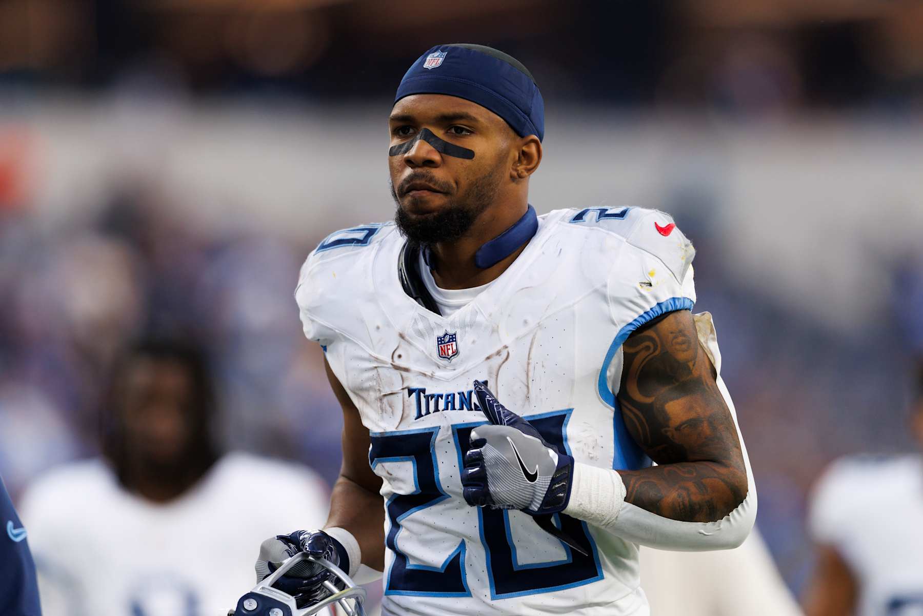INGLEWOOD, CALIFORNIA - NOVEMBER 10: Tony Pollard #20 of the Tennessee Titans walks off the field after a gameagainst the Los Angeles Chargers at SoFi Stadium on November 10, 2024 in Inglewood, California. (Photo by Ric Tapia/Getty Images)