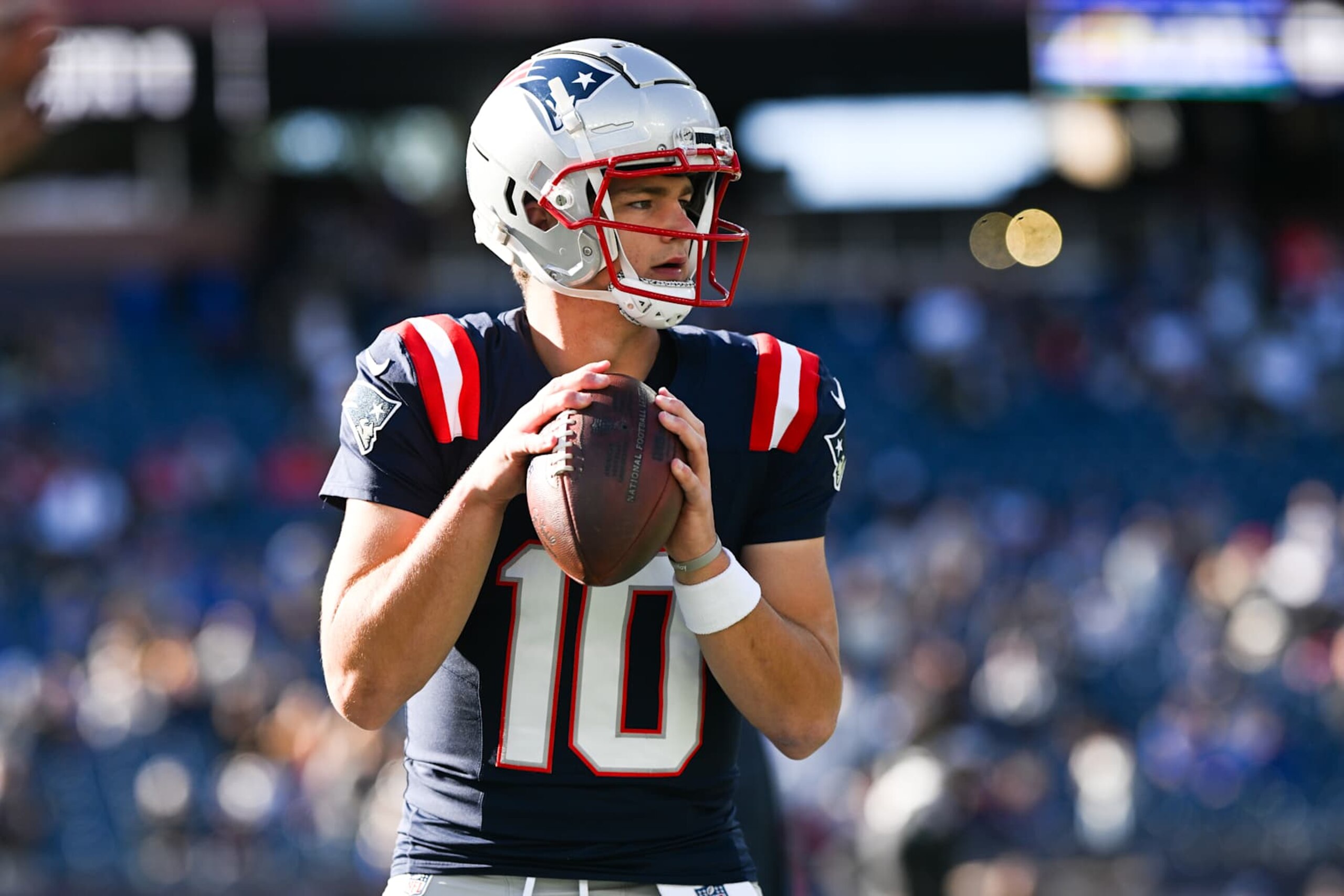 FOXBOROUGH, MASSACHUSETTS - NOVEMBER 17: Drake Maye #10 of the New England Patriots warms up prior to the start of the game against the Los Angeles Rams at Gillette Stadium on November 17, 2024 in Foxborough, Massachusetts. (Photo by Kathryn Riley/Getty Images)