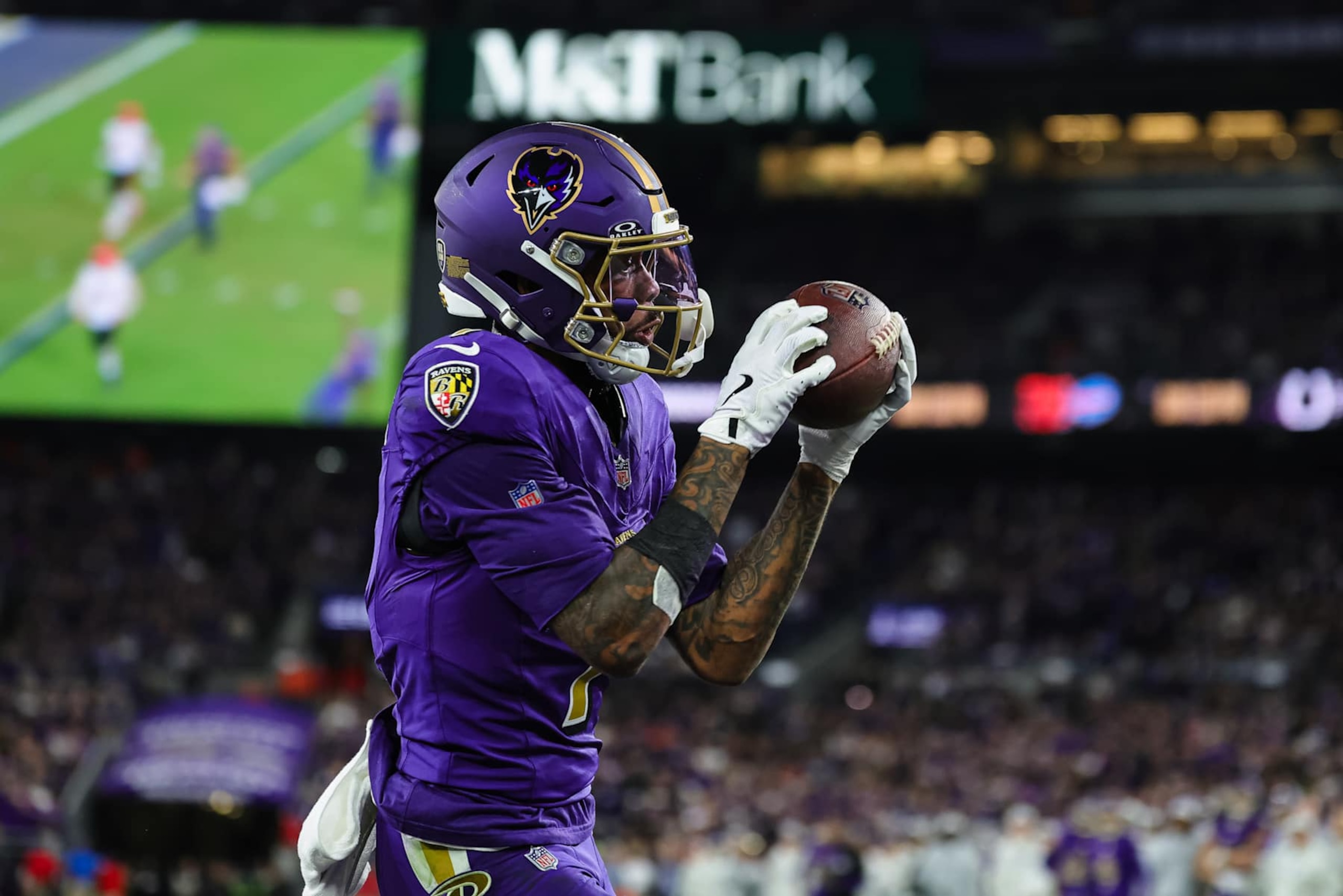BALTIMORE, MD - NOVEMBER 07: Rashod Bateman #7 of the Baltimore Ravens catches a pass for a touchdown  against the Cincinnati Bengals during the second half at M&T Bank Stadium on November 7, 2024 in Baltimore, Maryland. (Photo by Scott Taetsch/Getty Images)