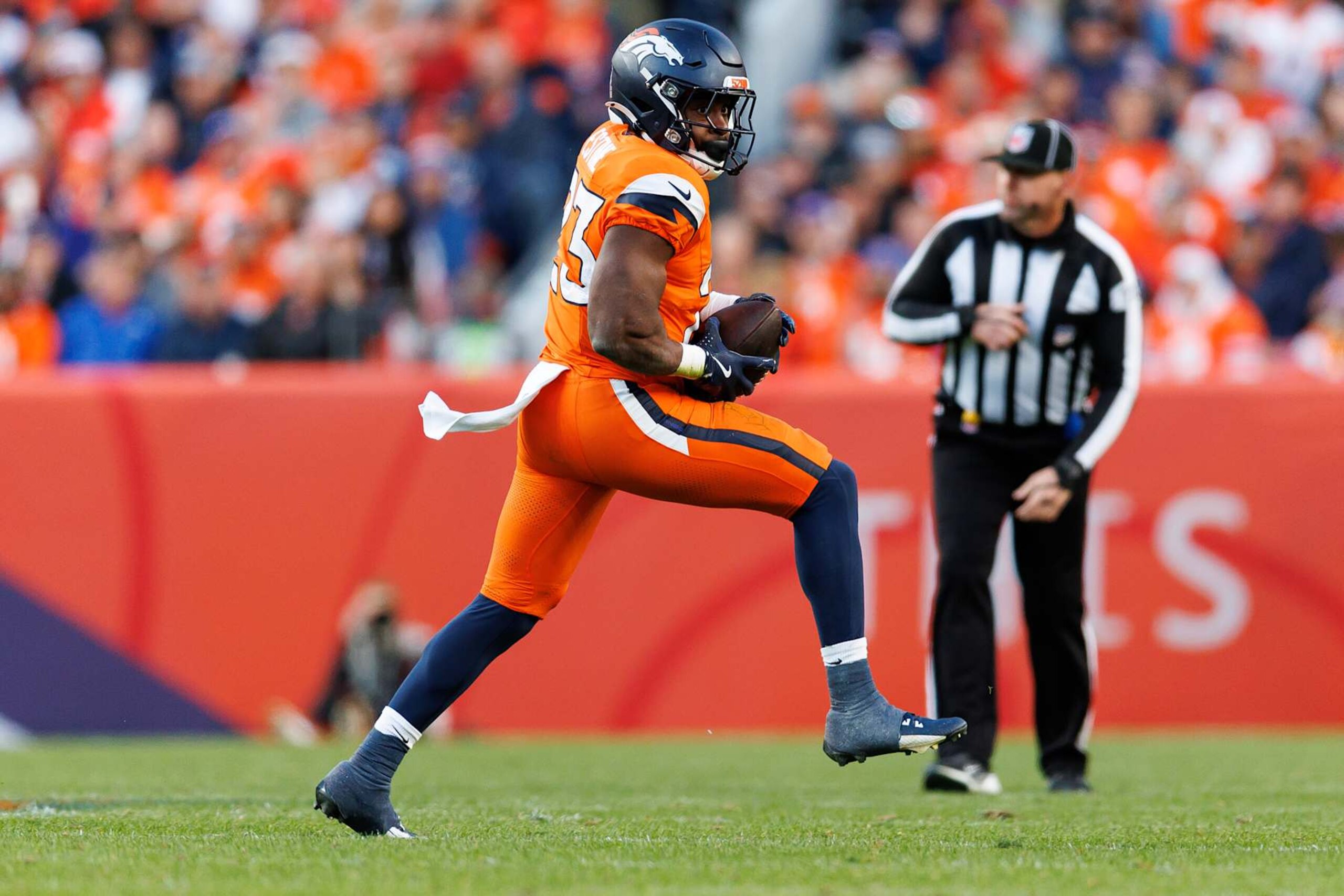 DENVER, COLORADO - NOVEMBER 17: Running back Audric Estime #23 of the Denver Broncos completes a catch during the second half of an NFL football game against the Atlanta Falcons, at Empower Field at Mile High on November 17, 2024 in Denver, Colorado. (Photo by Brooke Sutton/Getty Images)