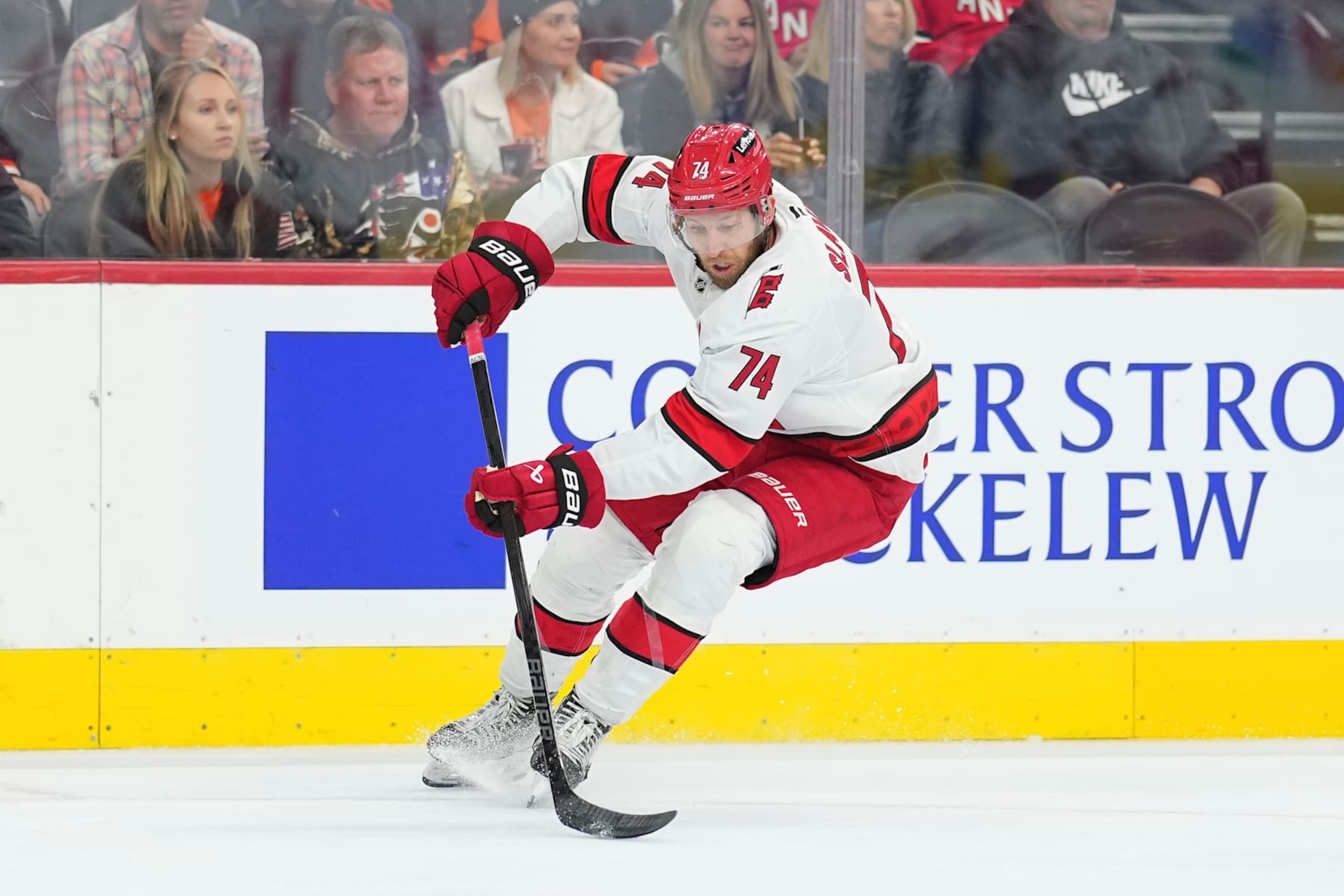 PHILADELPHIA, PENNSYLVANIA - NOVEMBER 20: Jaccob Slavin #74 of the Carolina Hurricanes controls the puck against the Philadelphia Flyers at the Wells Fargo Center on November 20, 2024 in Philadelphia, Pennsylvania. The Hurricanes defeated the Flyers 4-1. (Photo by Mitchell Leff/Getty Images)