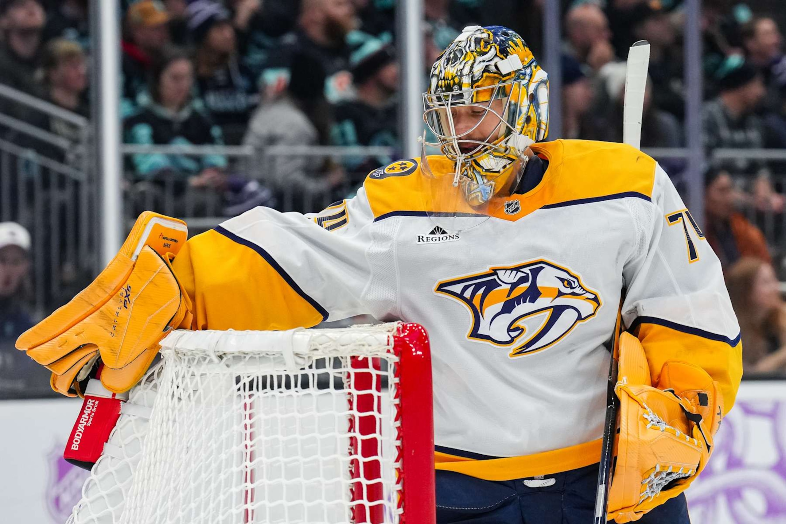 SEATTLE, WASHINGTON - NOVEMBER 20: Juuse Saros #74 of the Nashville Predators reaches for his water bottle during the first period of a game against the Seattle Kraken at Climate Pledge Arena on November 20, 2024 in Seattle, Washington. (Photo by Christopher Mast/NHLI via Getty Images)