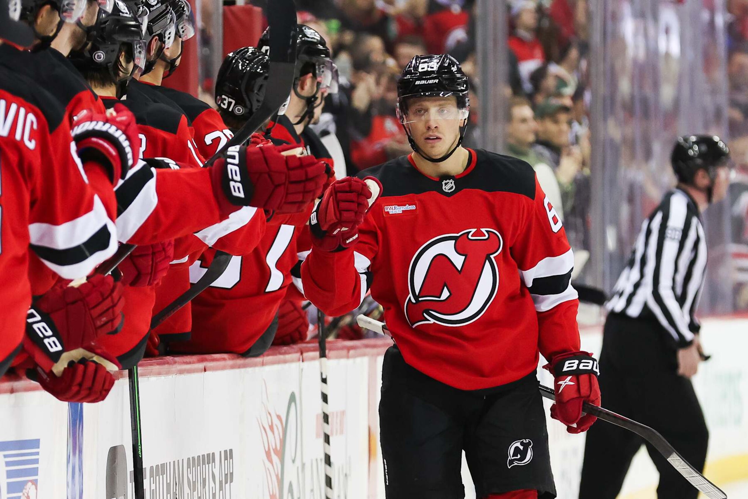 NEWARK, NEW JERSEY - NOVEMBER 21: Jesper Bratt #63 of the New Jersey Devils celebrates after scoring a goal during the first period of a NHL game against the Carolina Hurricanes at Prudential Center on November 21, 2024 in Newark, New Jersey. (Photo by Andrew Mordzynski/Getty Images)
