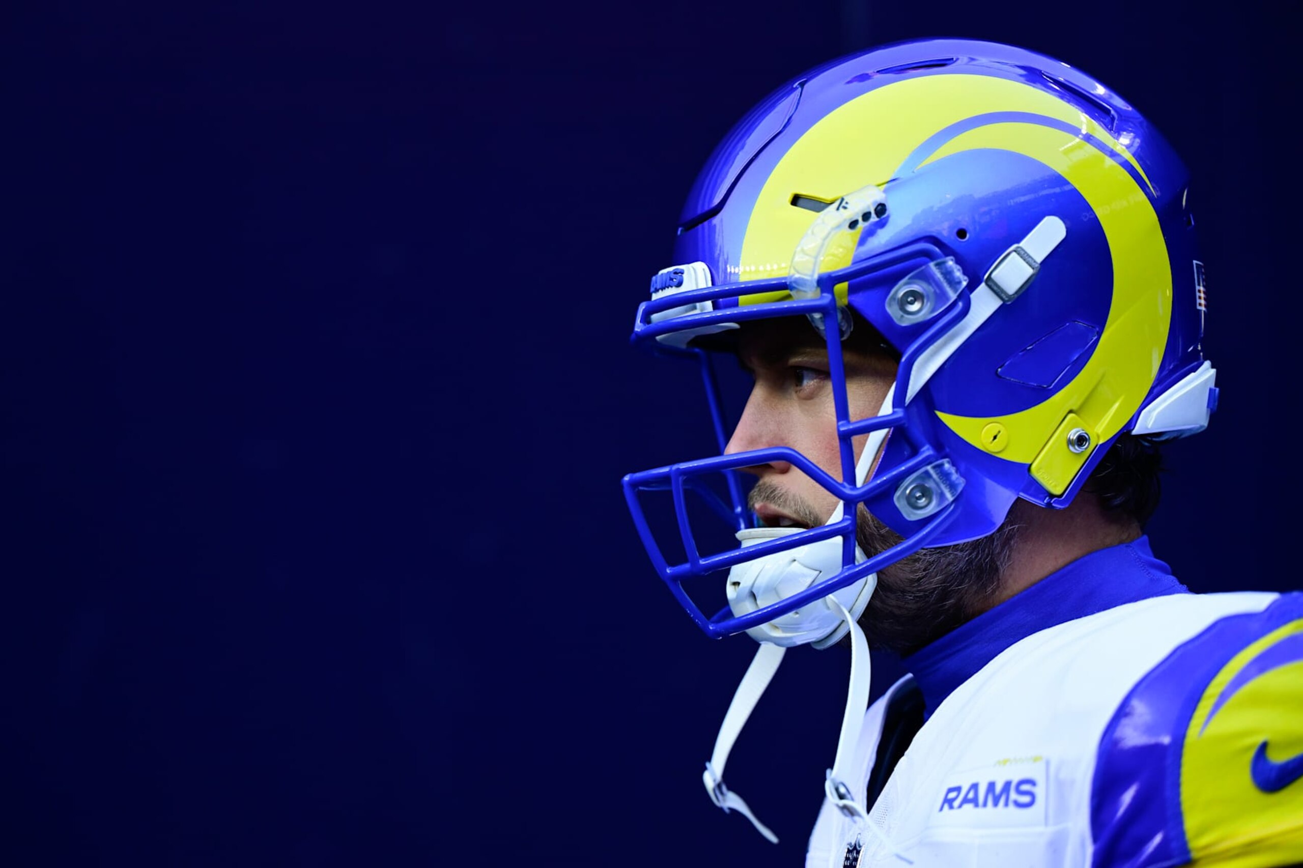 FOXBOROUGH, MASSACHUSETTS - NOVEMBER 17: Quarterback Matthew Stafford #9 of the Los Angeles Rams looks on prior to a game against the New England Patriots at Gillette Stadium on November 17, 2024 in Foxborough, Massachusetts. (Photo by Billie Weiss/Getty Images)