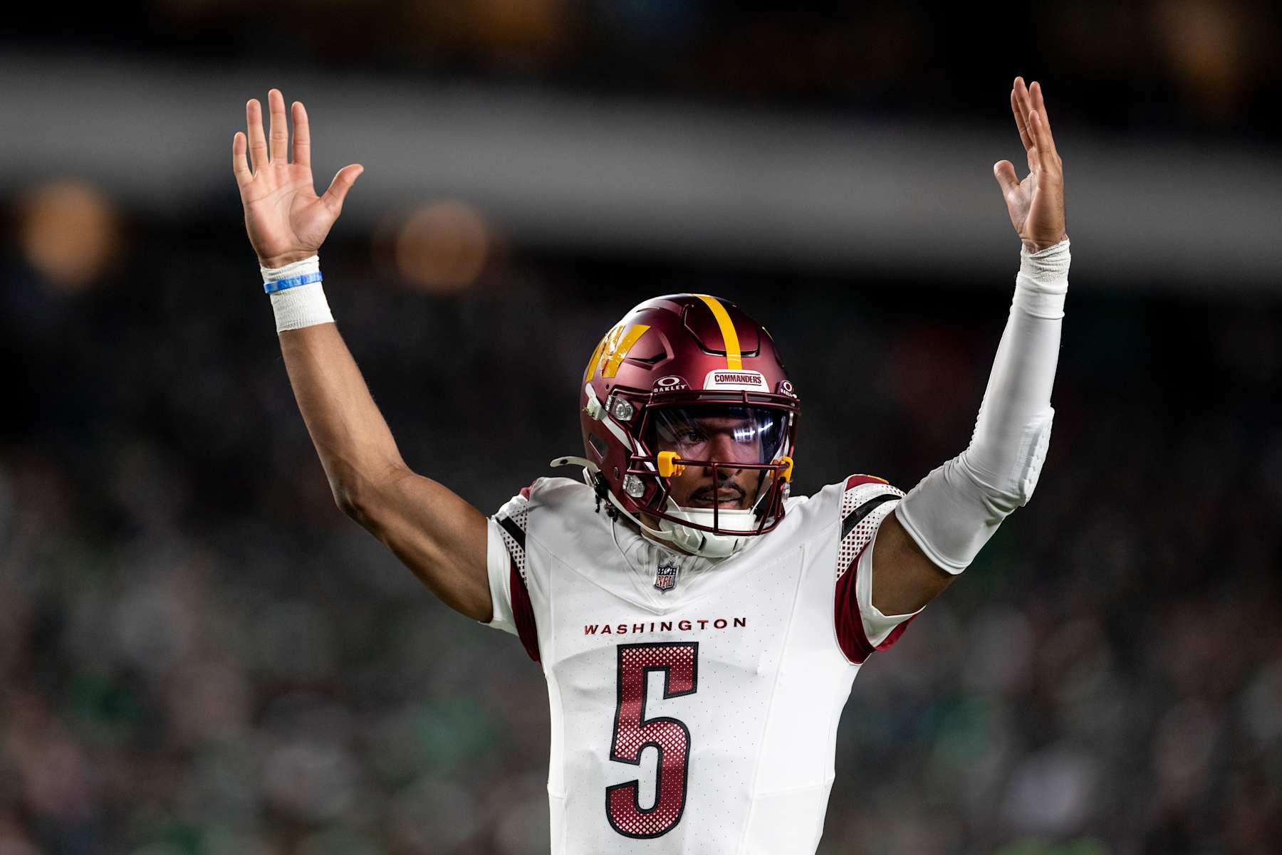PHILADELPHIA, PENNSYLVANIA - NOVEMBER 14: Jayden Daniels #5 of the Washington Commanders celebrates after a touchdown during an NFL Football game against the Philadelphia Eagles at Lincoln Financial Field on November 14, 2024 in Philadelphia, Pennsylvania. (Photo by Michael Owens/Getty Images)