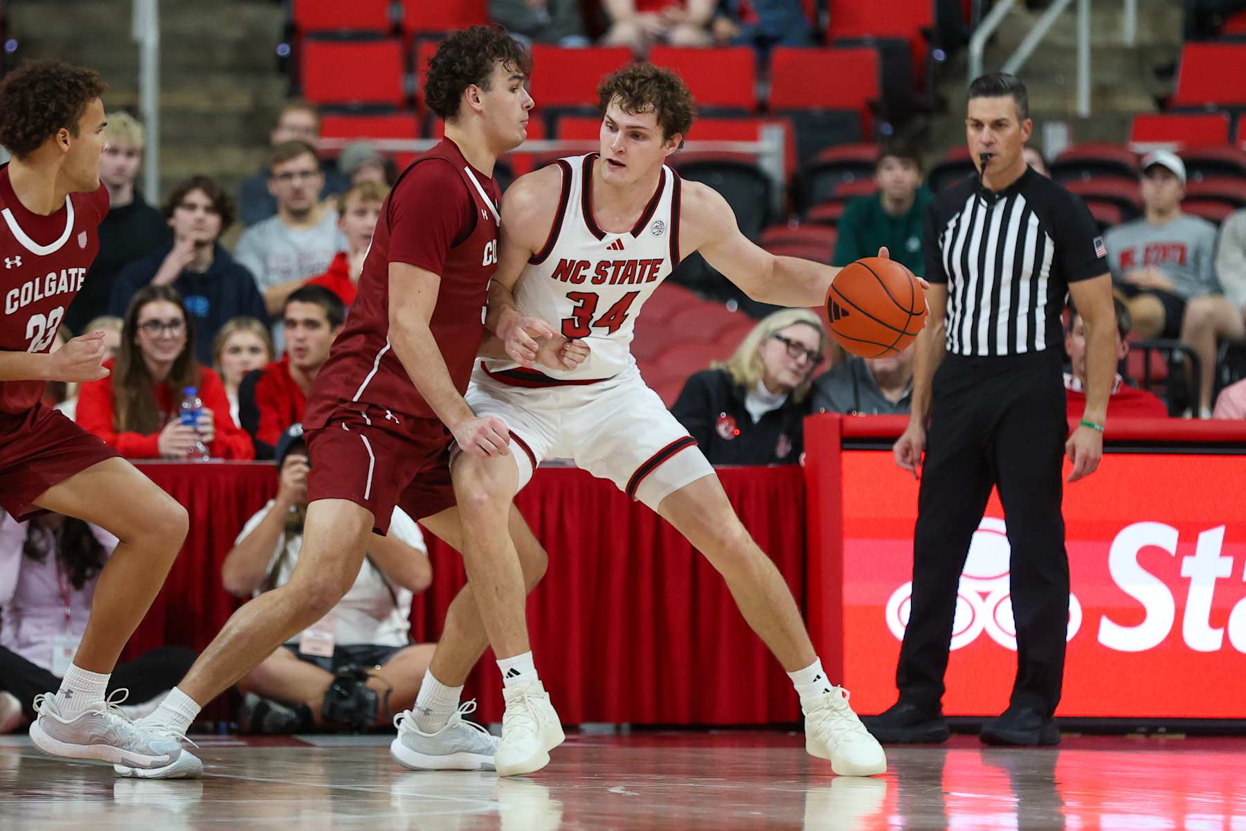 RALEIGH, NC - NOVEMBER 18: North Carolina State Wolfpack forward Ben Middlebrooks (34) presses to the interior during the college basketball game between the North Carolina State Wolfpack and the Colgate Raiders on November 18, 2024 at Lenovo Center in Raleigh, NC. (Photo by Nicholas Faulkner/Icon Sportswire via Getty Images)