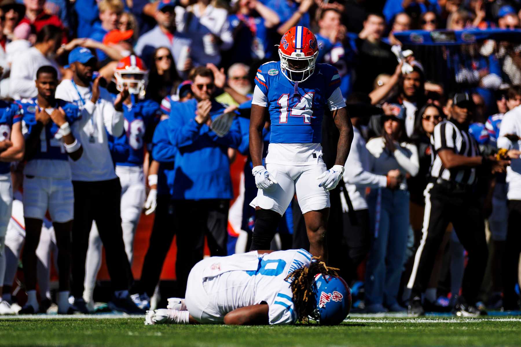 GAINESVILLE, FLORIDA - NOVEMBER 23: Jordan Castell #14 of the Florida Gators reacts to a play against Dae'Quan Wright #8 of the Mississippi Rebels during the first halfof a game at Ben Hill Griffin Stadium on November 23, 2024 in Gainesville, Florida. (Photo by James Gilbert/Getty Images)