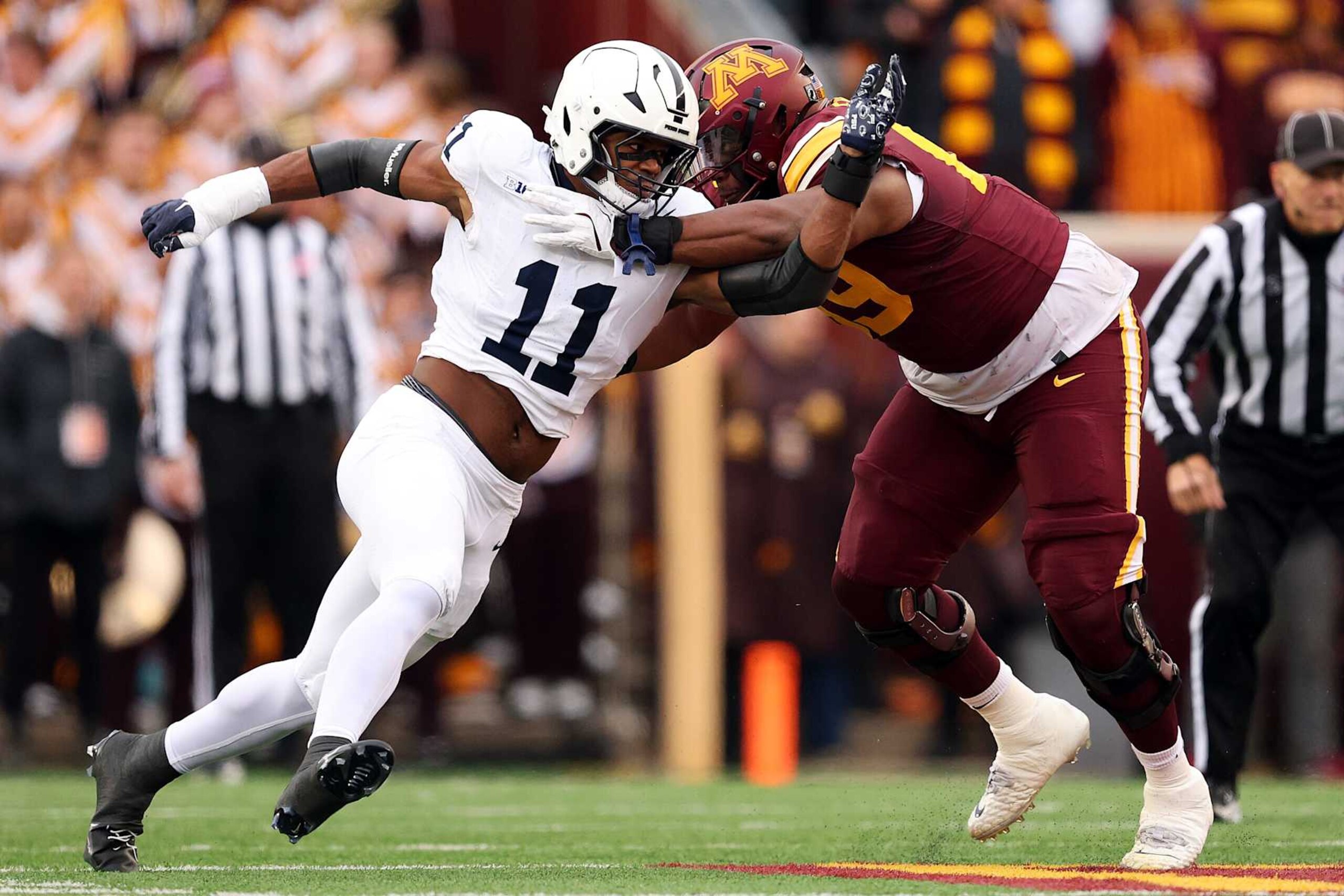 MINNEAPOLIS, MINNESOTA - NOVEMBER 23: Abdul Carter #11 of the Penn State Nittany Lions competes against Aireontae Ersery #69 of the Minnesota Golden Gophers in the first quarter at Huntington Bank Stadium on November 23, 2024 in Minneapolis, Minnesota. (Photo by David Berding/Getty Images) MINNEAPOLIS, MINNESOTA - NOVEMBER 23: Abdul Carter #11 of the Penn State Nittany Lions competes against Aireontae Ersery #69 of the Minnesota Golden Gophers in the first quarter at Huntington Bank Stadium on November 23, 2024 in Minneapolis, Minnesota. (Photo by David Berding/Getty Images)