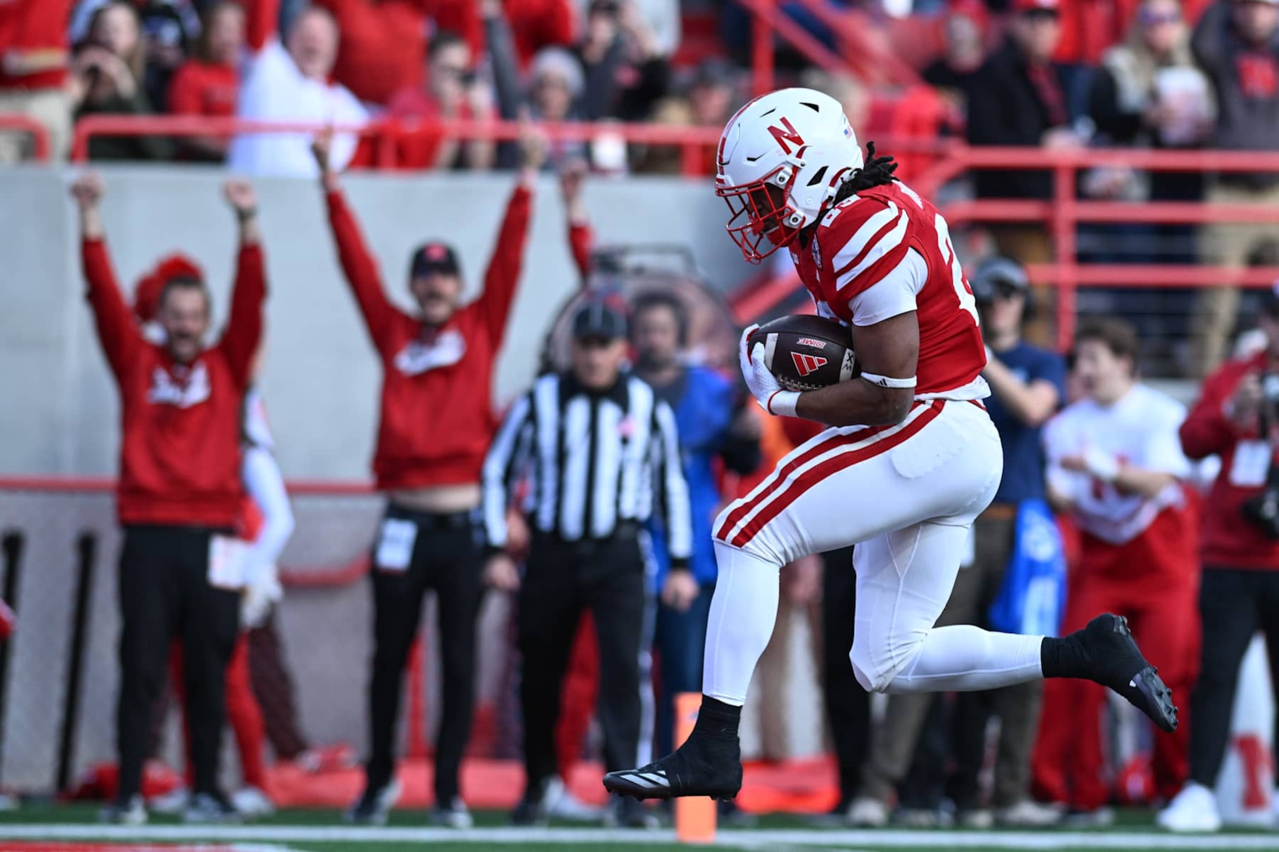 LINCOLN, NEBRASKA - NOVEMBER 23: Dante Dowdell #23 of the Nebraska Cornhuskers scores against the Wisconsin Badgers during the second quarter at Memorial Stadium on November 23, 2024 in Lincoln, Nebraska. (Photo by Steven Branscombe/Getty Images) LINCOLN, NEBRASKA - NOVEMBER 23: Dante Dowdell #23 of the Nebraska Cornhuskers scores against the Wisconsin Badgers during the second quarter at Memorial Stadium on November 23, 2024 in Lincoln, Nebraska. (Photo by Steven Branscombe/Getty Images)