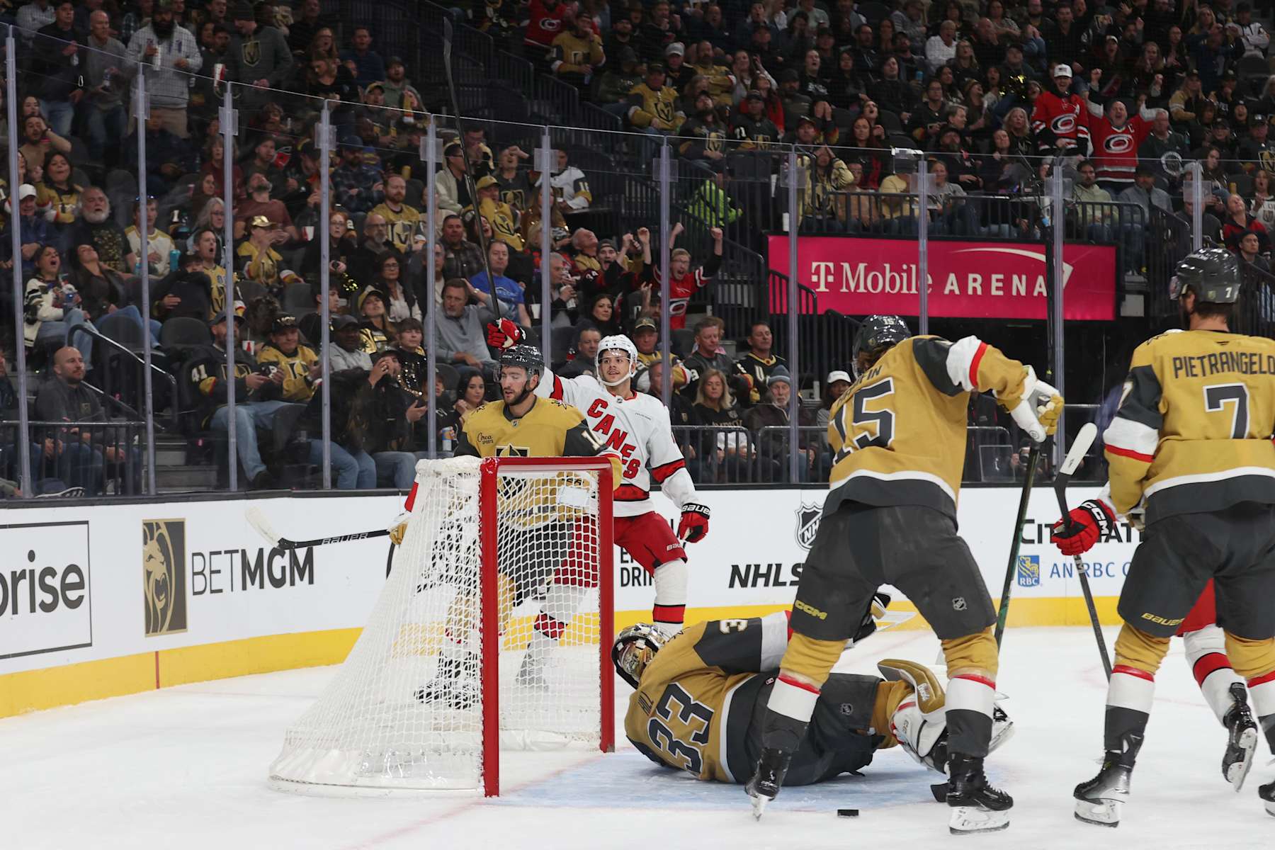 LAS VEGAS, NEVADA - NOVEMBER 11: Jesperi Kotkaniemi #82 of the Carolina Hurricanes celebrates after a goal during the first period against the Vegas Golden Knights at T-Mobile Arena on November 11, 2024 in Las Vegas, Nevada. (Photo by Zak Krill/NHLI via Getty Images)