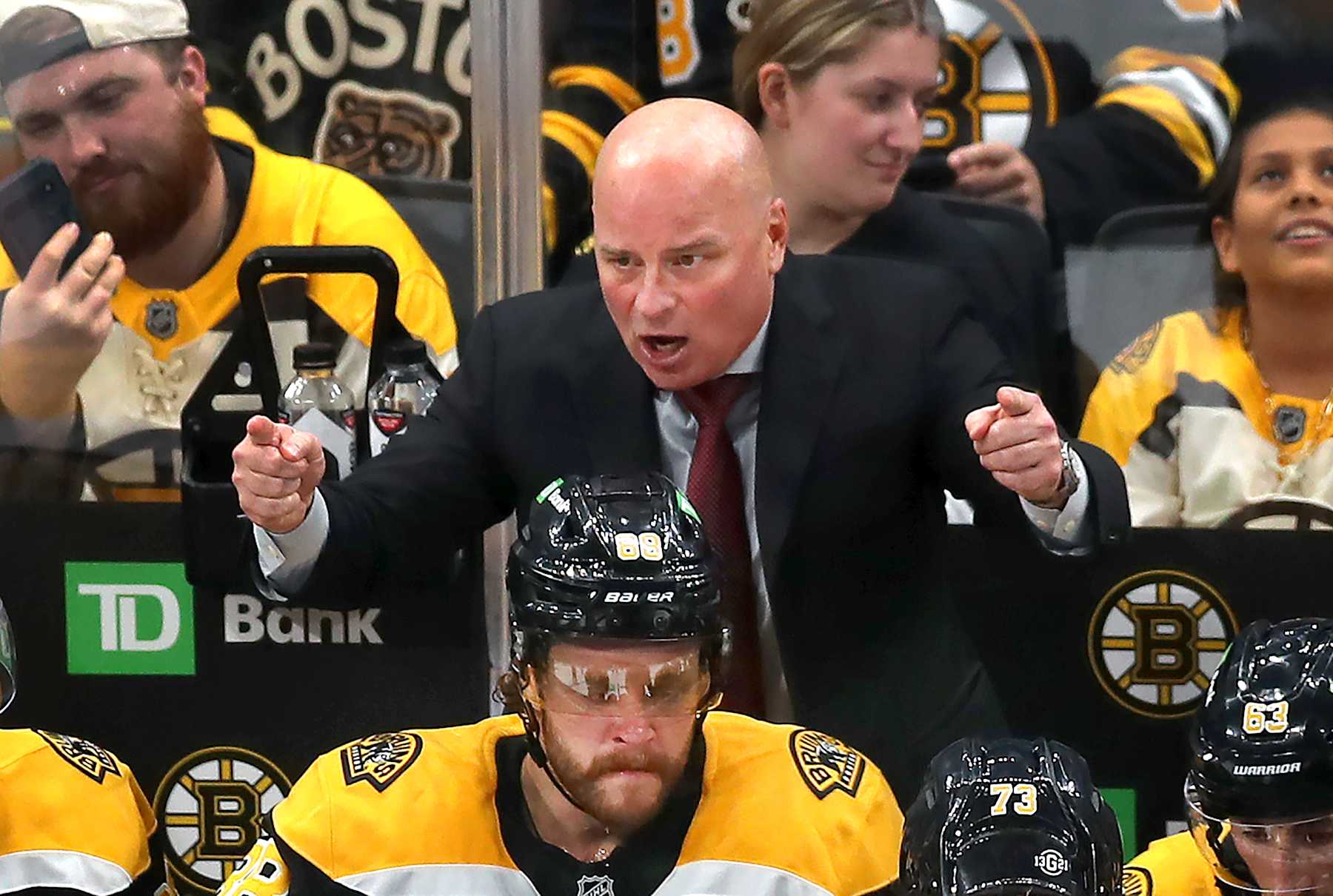 Boston, MA - October 24: Boston Bruins head coach Jim Montgomery talks to his team during a third period timeout. (Photo by John Tlumacki/The Boston Globe via Getty Images)