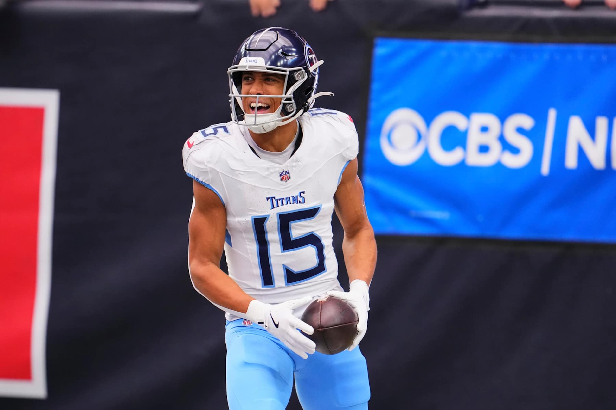 HOUSTON, TX - NOVEMBER 24: Nick Westbrook-Ikhine #15 of the Tennessee Titans celebrates after scoring a touchdown against the Houston Texans during the first half of an NFL football game at NRG Stadium on November 24, 2024 in Houston, Texas. (Photo by Cooper Neill/Getty Images)