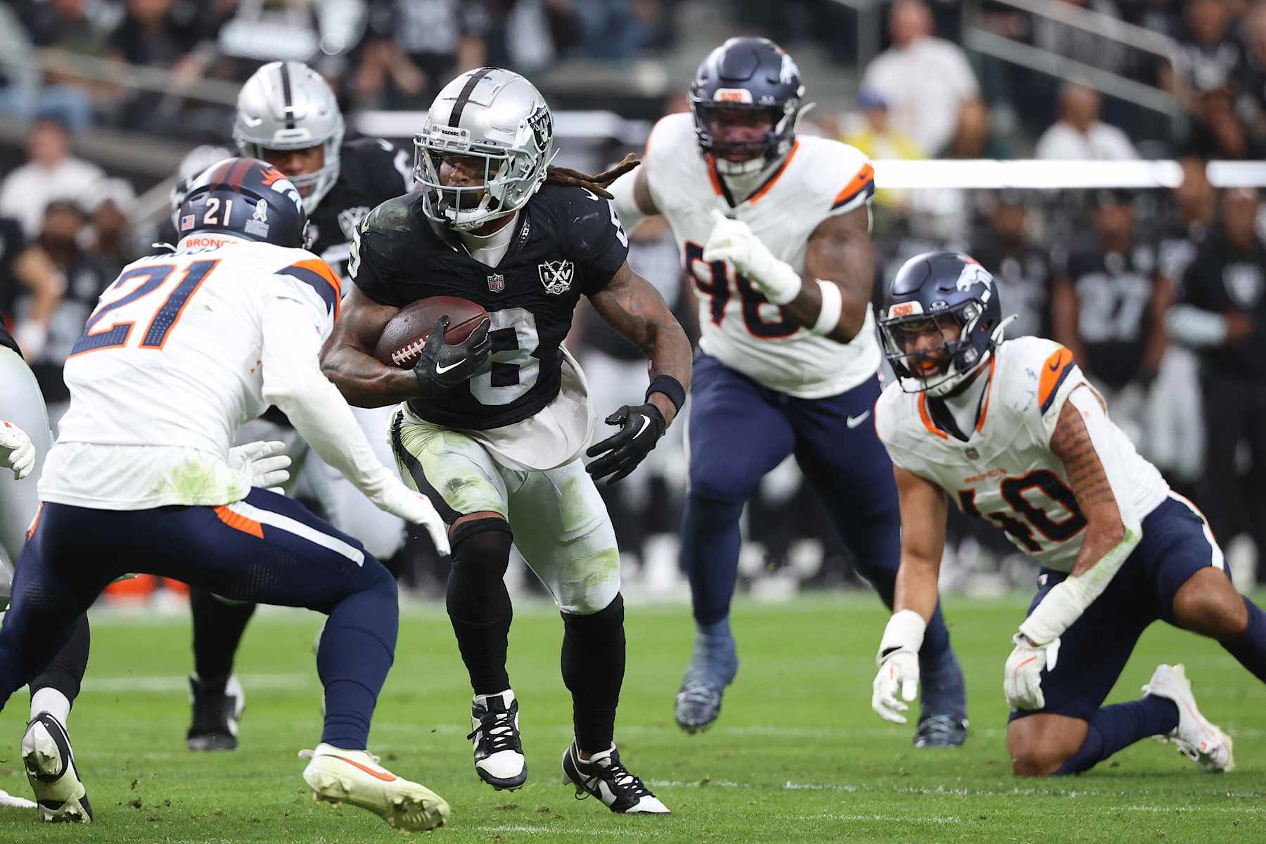 LAS VEGAS, NEVADA - NOVEMBER 24: Ameer Abdullah #8 of the Las Vegas Raiders runs with the ball during the second quarter against the Denver Broncos at Allegiant Stadium on November 24, 2024 in Las Vegas, Nevada. (Photo by Ian Maule/Getty Images) LAS VEGAS, NEVADA - NOVEMBER 24: Ameer Abdullah #8 of the Las Vegas Raiders runs with the ball during the second quarter against the Denver Broncos at Allegiant Stadium on November 24, 2024 in Las Vegas, Nevada. (Photo by Ian Maule/Getty Images)
