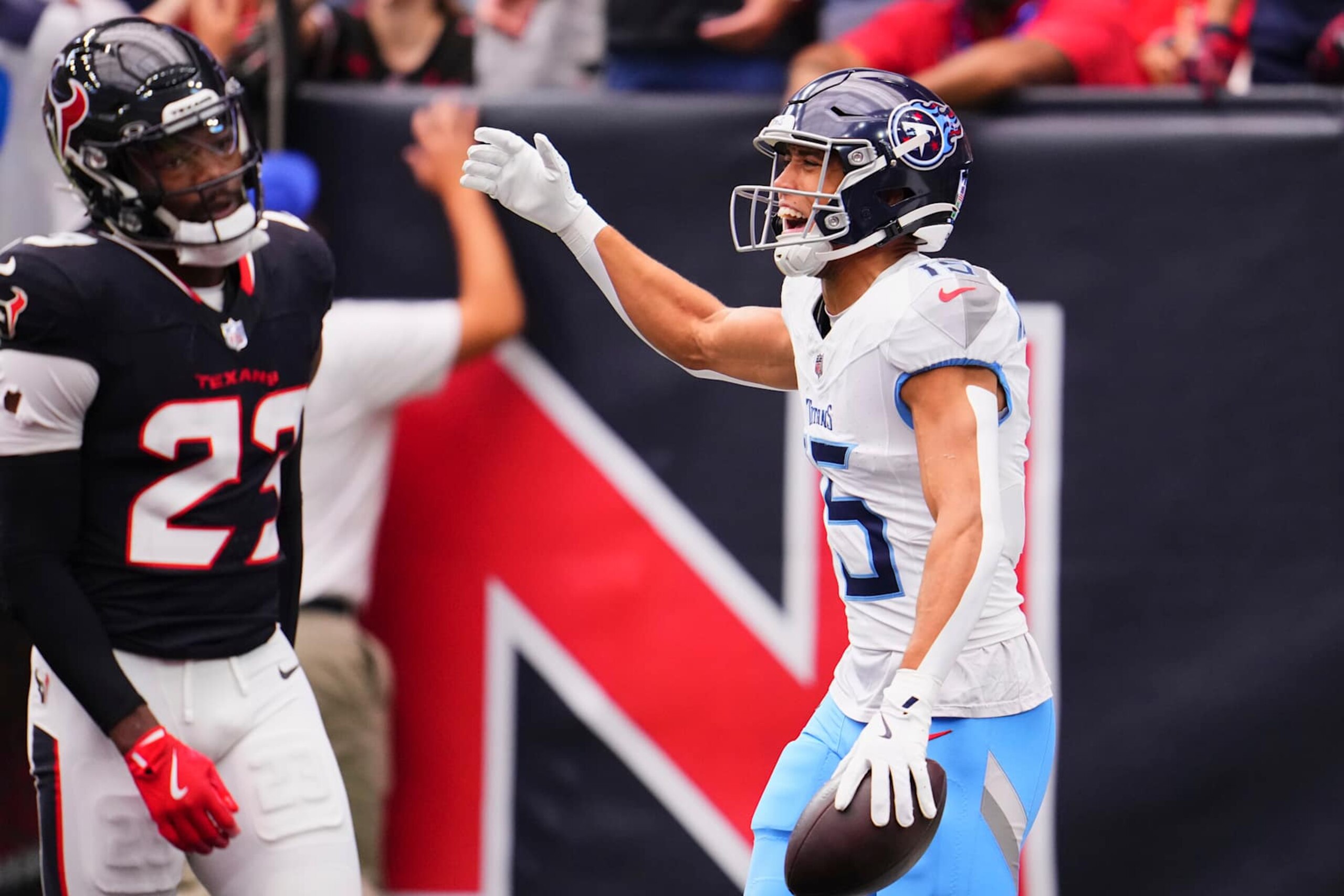 HOUSTON, TX - NOVEMBER 24: Nick Westbrook-Ikhine #15 of the Tennessee Titans celebrates after scoring a touchdown against the Houston Texans during the first half of an NFL football game at NRG Stadium on November 24, 2024 in Houston, Texas. (Photo by Cooper Neill/Getty Images)