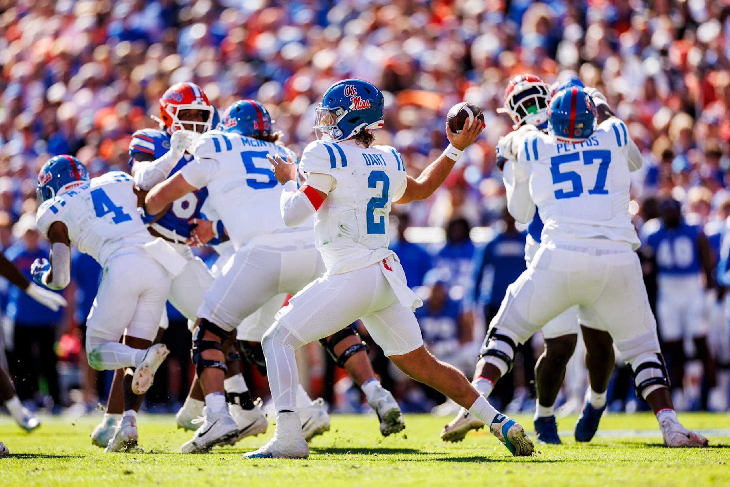GAINESVILLE, FLORIDA - NOVEMBER 23: Jaxson Dart #2 of the Mississippi Rebels throws a pass during the first half of a game against the Florida Gators at Ben Hill Griffin Stadium on November 23, 2024 in Gainesville, Florida. (Photo by James Gilbert/Getty Images)