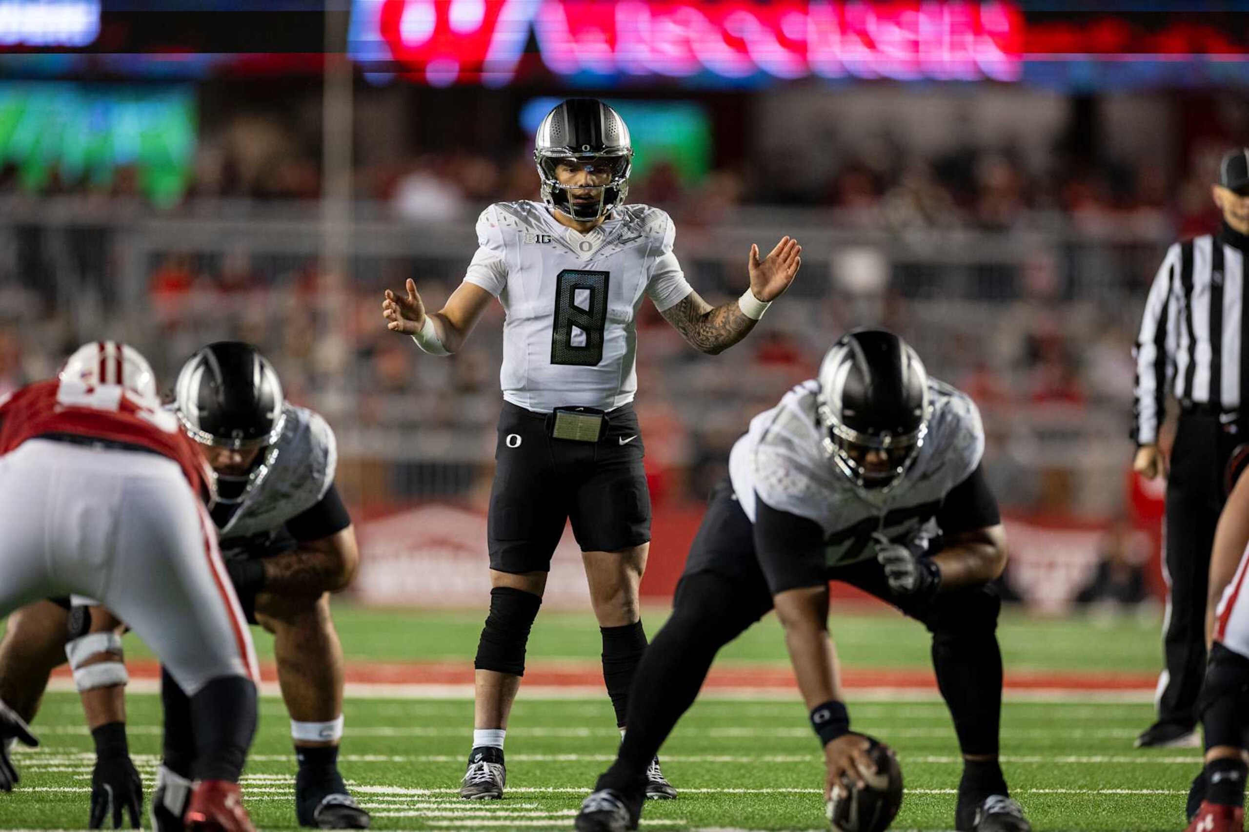 MADISON, WI - NOVEMBER 16: Oregon Ducks quarterback Dillon Gabriel (8) gets ready to snap the football durning a college football game between the Oregon Ducks and the Wisconsin Badgers on November 16th, 2024 at Barry Alvarez field inside Camp Randall Stadium in Madison, WI. (Photo by Dan Sanger/Icon Sportswire via Getty Images)