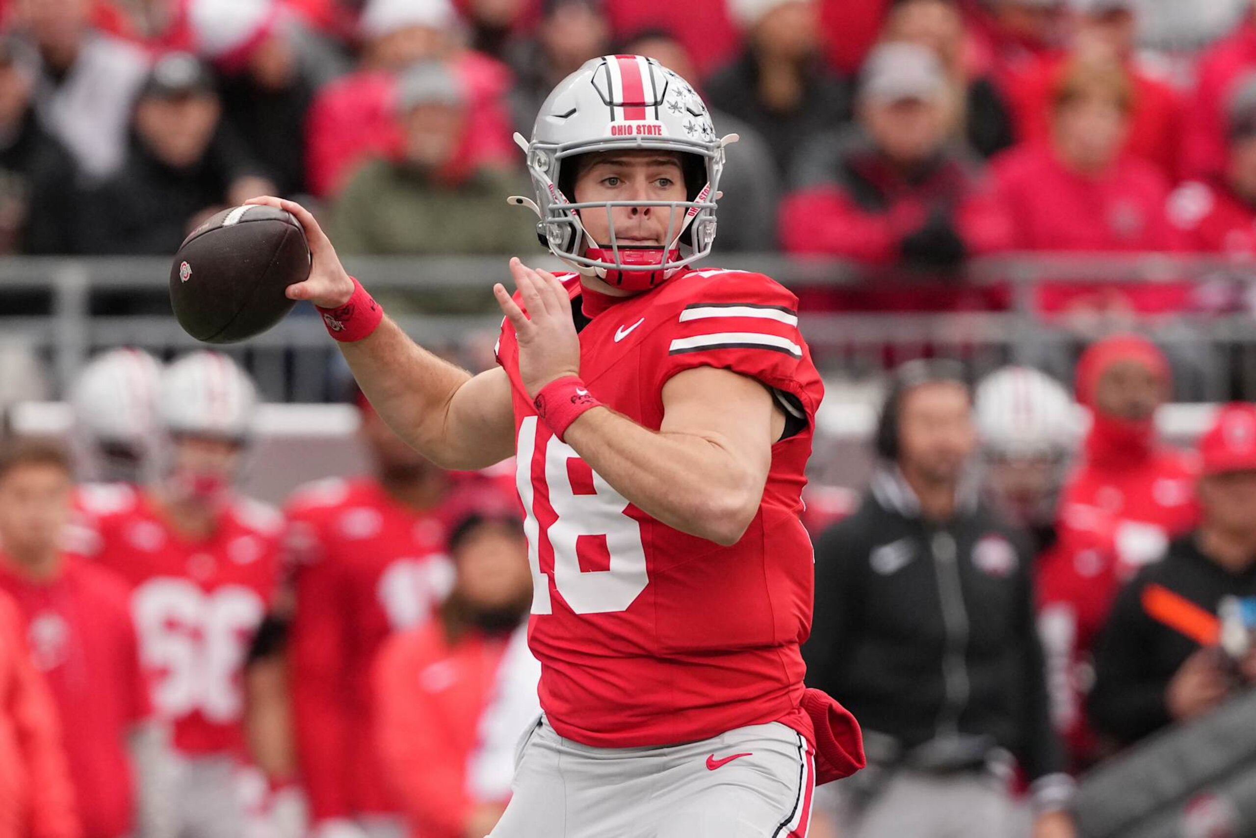 COLUMBUS, OHIO - NOVEMBER 23: Will Howard #18 of the Ohio State Buckeyes throws a pass in the first quarter against the Indiana Hoosiers at Ohio Stadium on November 23, 2024 in Columbus, Ohio. (Photo by Jason Mowry/Getty Images)
