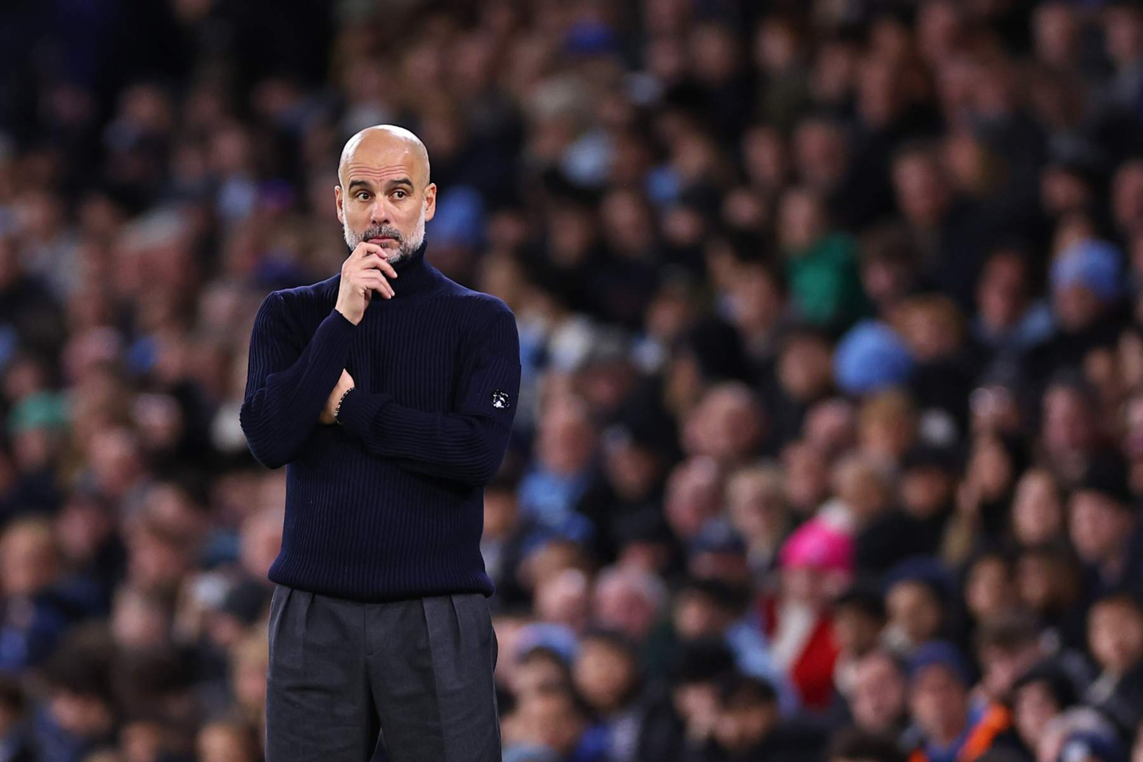 MANCHESTER, ENGLAND - NOVEMBER 23: Pep Guardiola manager of Manchester City looks on during the Premier League match between Manchester City FC and Tottenham Hotspur FC at Etihad Stadium on November 23, 2024 in Manchester, England. (Photo by Robbie Jay Barratt - AMA/Getty Images) MANCHESTER, ENGLAND - NOVEMBER 23: Pep Guardiola manager of Manchester City looks on during the Premier League match between Manchester City FC and Tottenham Hotspur FC at Etihad Stadium on November 23, 2024 in Manchester, England. (Photo by Robbie Jay Barratt - AMA/Getty Images)