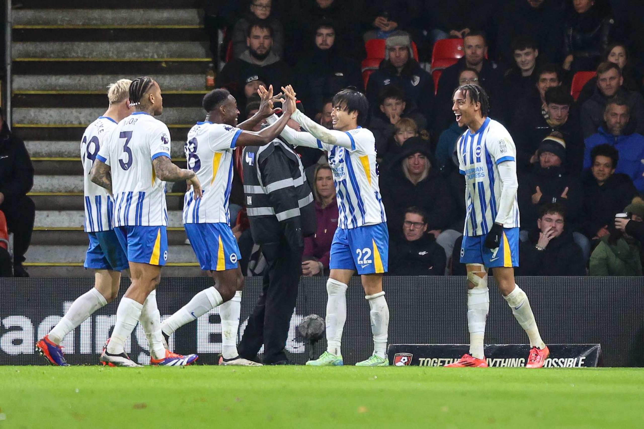 BOURNEMOUTH, ENGLAND - NOVEMBER 23: Kaoru Mitoma of Brighton & Hove Albion is congratulated by team-mates after he scores a goal to make it 2-0 during the Premier League match between AFC Bournemouth and Brighton & Hove Albion FC at Vitality Stadium on November 23, 2024 in Bournemouth, England. (Photo by Robin Jones - AFC Bournemouth/AFC Bournemouth via Getty Images)