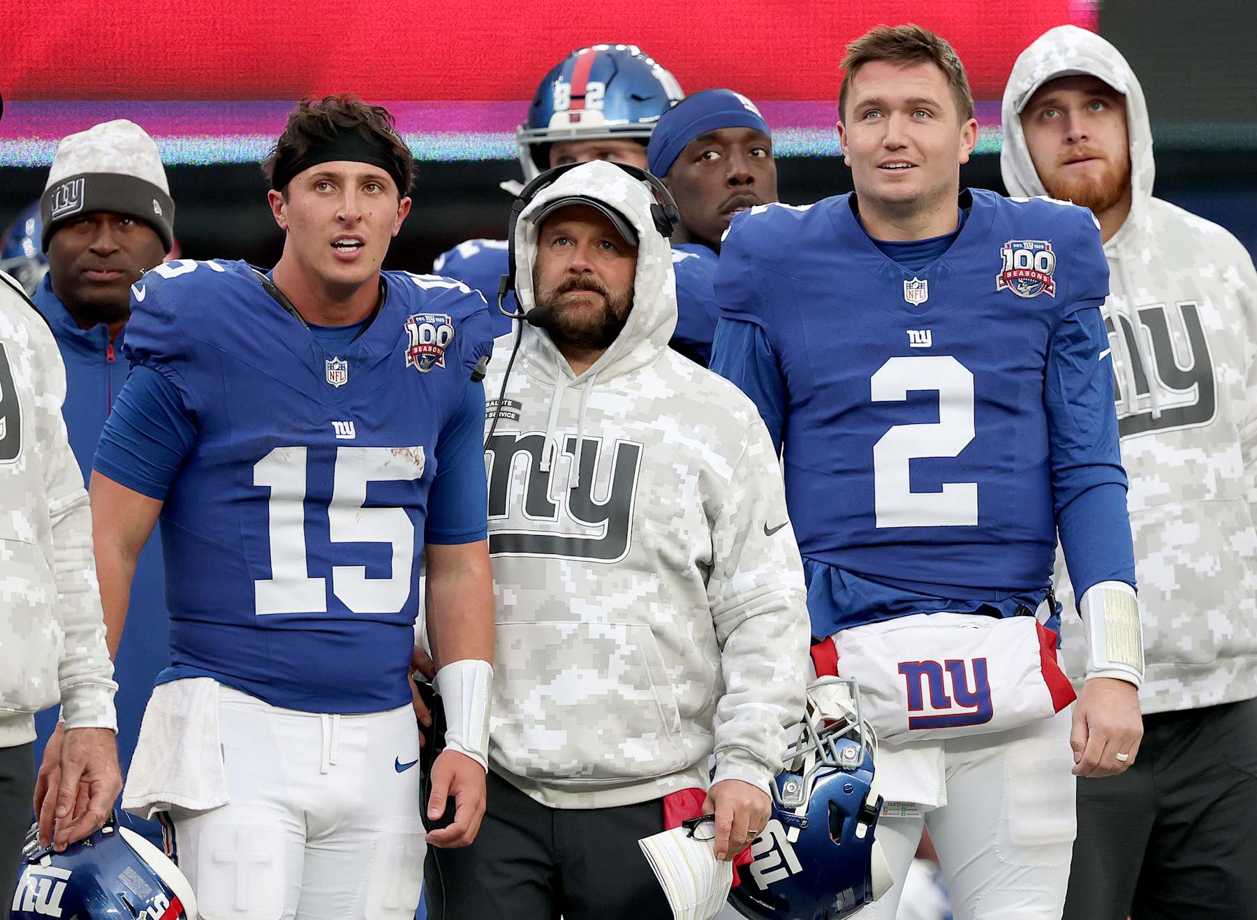 EAST RUTHERFORD, NEW JERSEY - NOVEMBER 24: Tommy DeVito #15, head coach Brian Daboll and Drew Lock #2 of the New York Giants react on the sideline the extra point was made on a Giants touchdown against the Tampa Bay Buccaneers at MetLife Stadium on November 24, 2024 in East Rutherford, New Jersey. (Photo by Elsa/Getty Images)