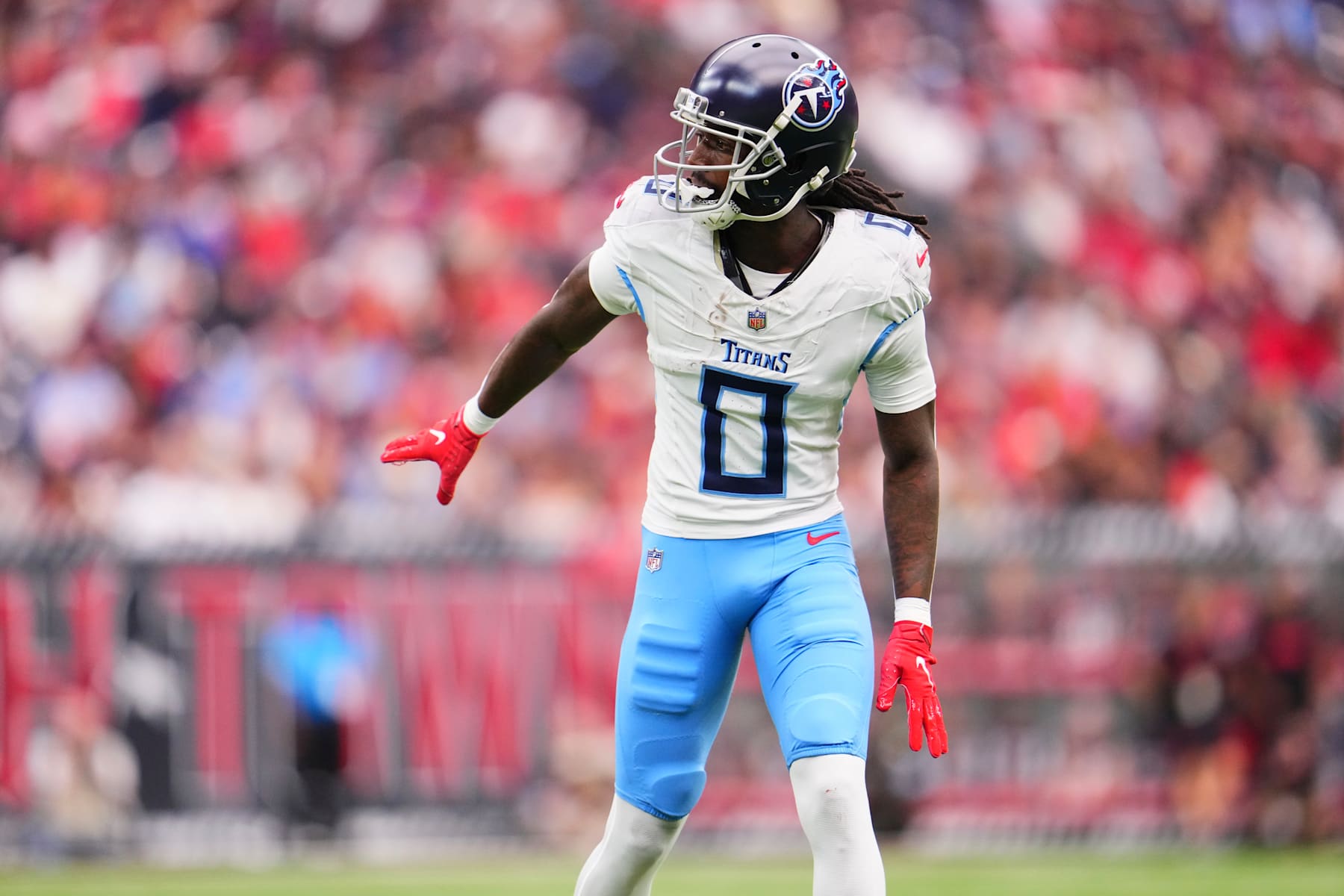 HOUSTON, TX - NOVEMBER 24: Calvin Ridley #0 of the Tennessee Titans lines up at the line of scrimmage against the Houston Texans during the first half of an NFL football game at NRG Stadium on November 24, 2024 in Houston, Texas. (Photo by Cooper Neill/Getty Images)