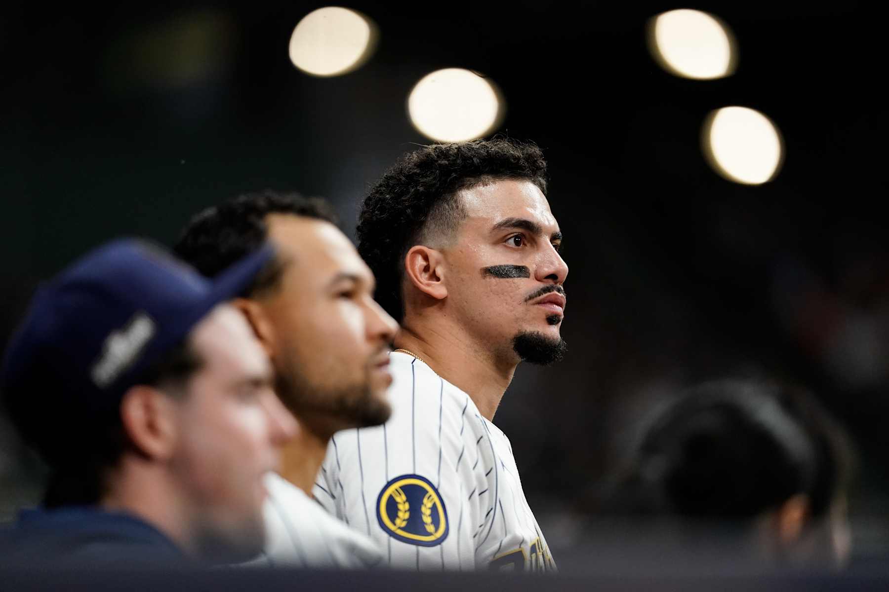 MILWAUKEE, WI - OCTOBER 02: Willy Adames #27 of the Milwaukee Brewers looks on from the dugout during Game 2 of the Wild Card Series presented by T-Mobile 5G Home Internet between the New York Mets and the Milwaukee Brewers at American Family Field on Wednesday, October 2, 2024 in Milwaukee, Wisconsin. (Photo by Aaron Gash/MLB Photos via Getty Images)