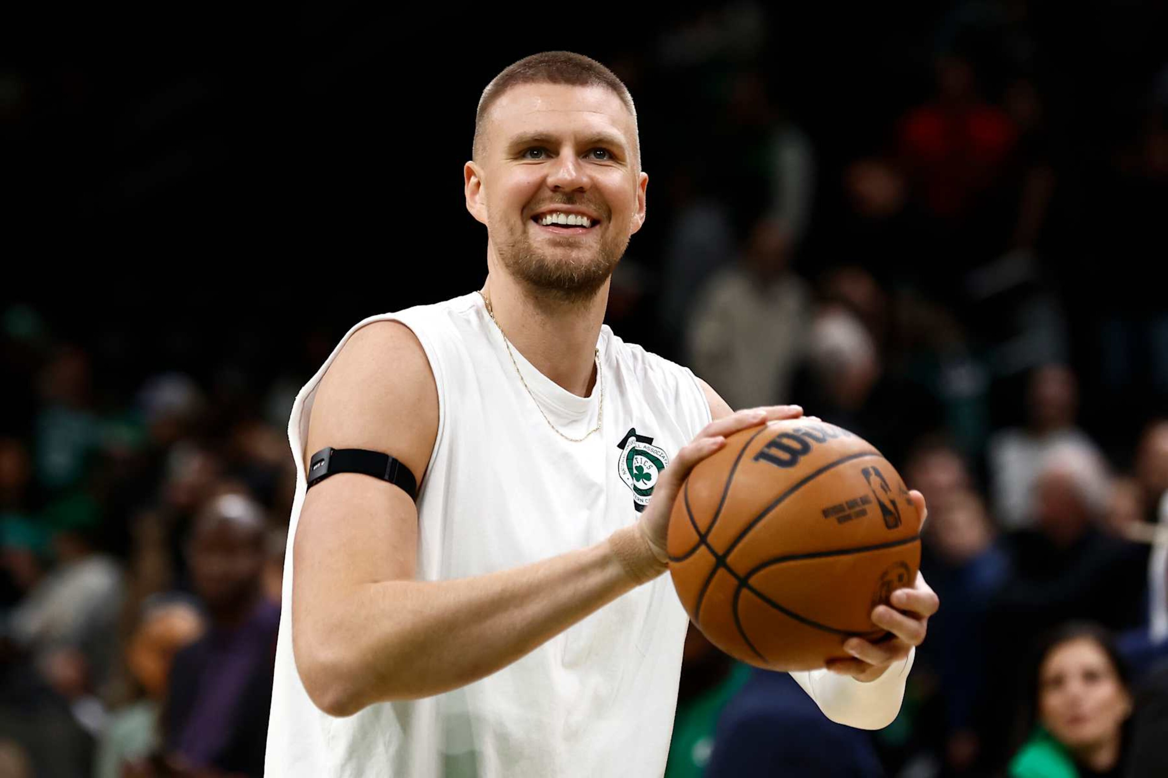 BOSTON, MA - NOVEMBER 16: Kristaps Porzingis #8 of the Boston Celtics smiles as he warms up before the game between the Boston Celtics and the Toronto Raptors at TD Garden on November 16, 2024 in Boston, Massachusetts. NOTE TO USER: User expressly acknowledges and agrees that, by downloading and/or using this Photograph, user is consenting to the terms and conditions of the Getty Images License Agreement. (Photo By Winslow Townson/Getty Images) BOSTON, MA - NOVEMBER 16: Kristaps Porzingis #8 of the Boston Celtics smiles as he warms up before the game between the Boston Celtics and the Toronto Raptors at TD Garden on November 16, 2024 in Boston, Massachusetts. NOTE TO USER: User expressly acknowledges and agrees that, by downloading and/or using this Photograph, user is consenting to the terms and conditions of the Getty Images License Agreement. (Photo By Winslow Townson/Getty Images)