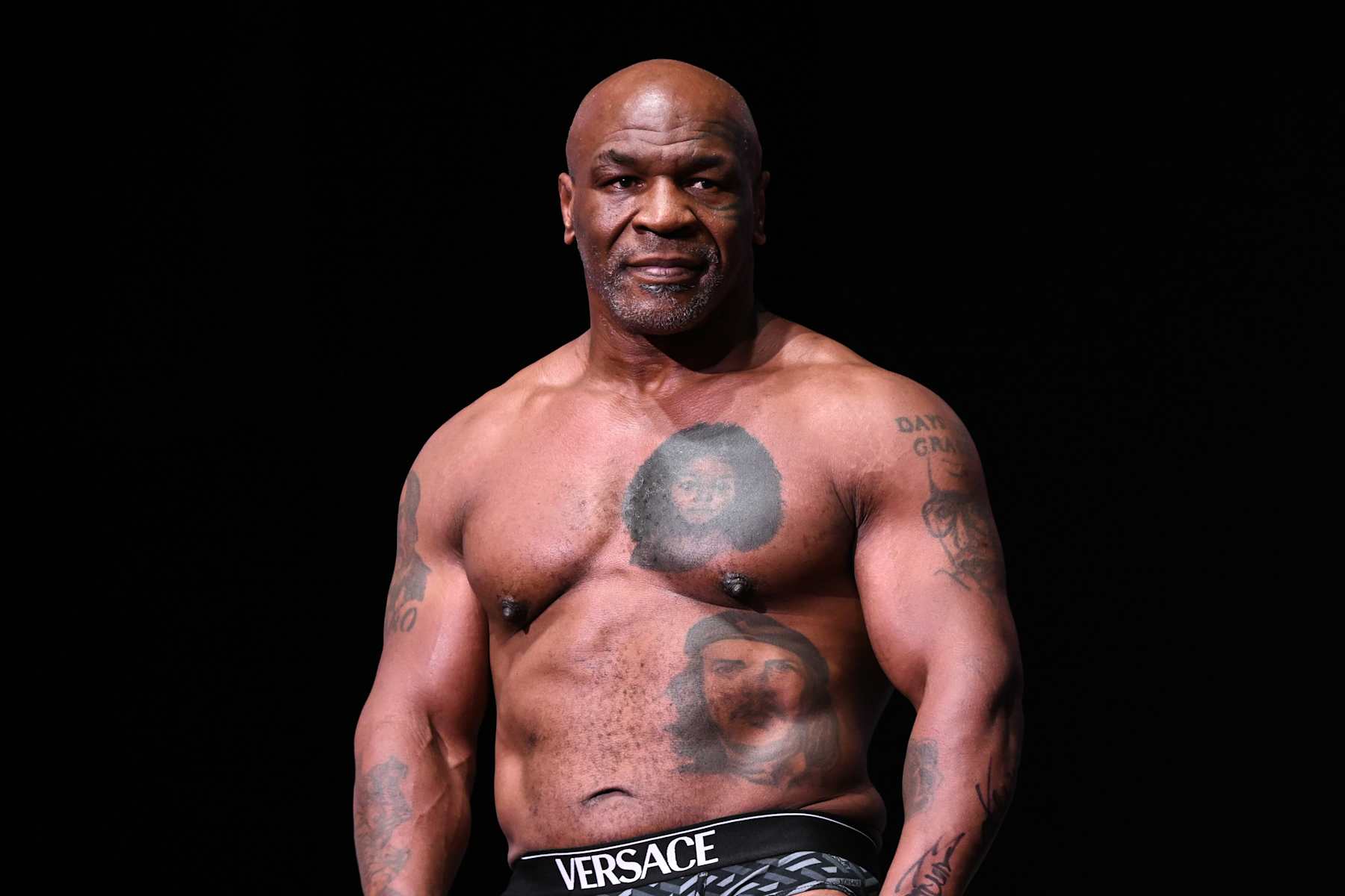 IRVING, TEXAS - NOVEMBER 14: Mike Tyson gets on scale during Weigh-In at the Toyota Music Factory in Irving, Texas on November 14, 2024 ahead of his match with Jake Paul for heavyweight world titles of the Premiere Boxing Championship which will be on November 15 Friday night at AT&T Stadium in Arlington, Texas, United States. (Photo by Tayfun Coskun/Anadolu via Getty Images)