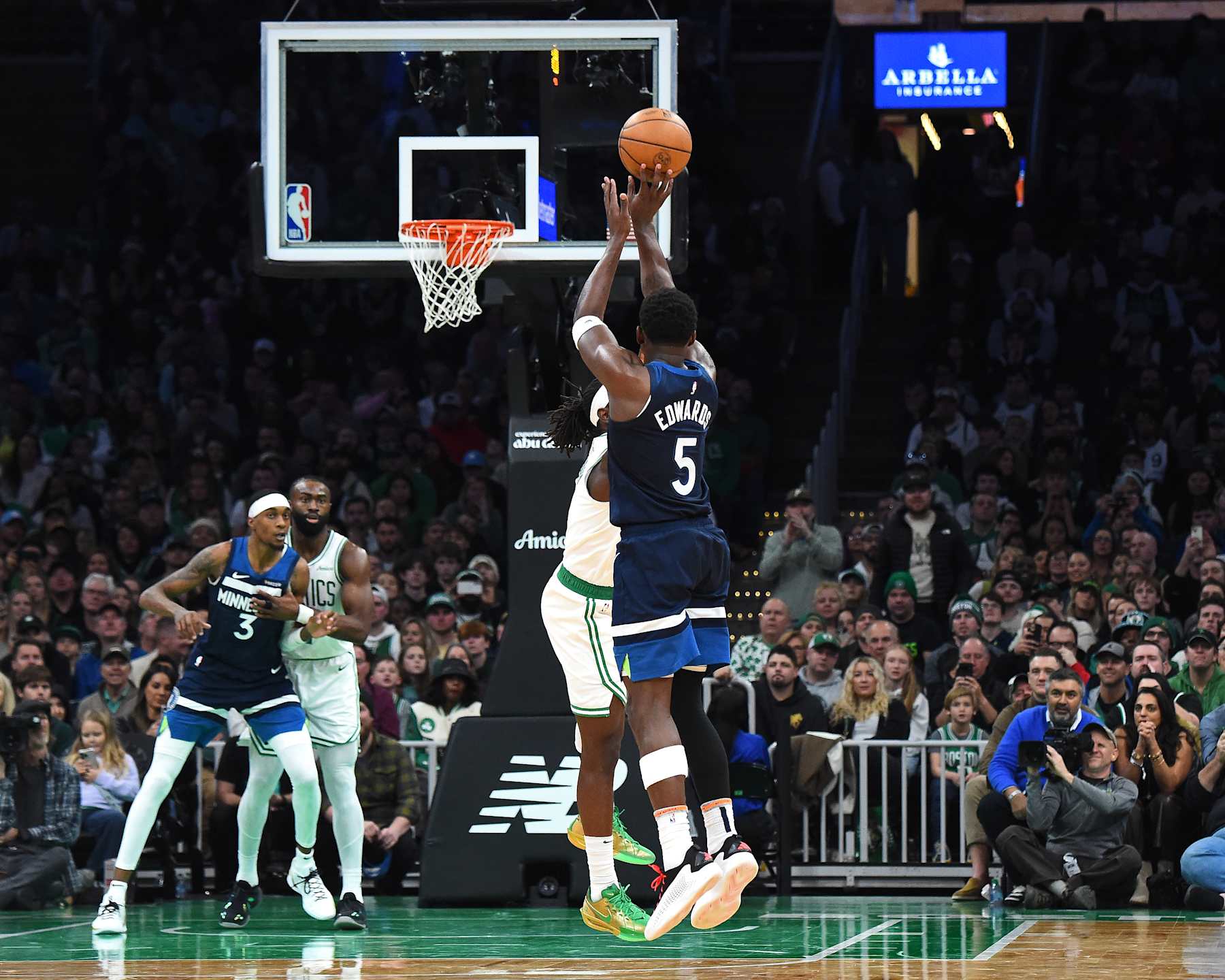 BOSTON, MA - NOVEMBER 24: Anthony Edwards #5 of the Minnesota Timberwolves three point basket during the game against the Boston Celtics on November 24, 2024 at the TD Garden in Boston, Massachusetts. NOTE TO USER: User expressly acknowledges and agrees that, by downloading and or using this photograph, User is consenting to the terms and conditions of the Getty Images License Agreement. Mandatory Copyright Notice: Copyright 2024 NBAE(Photo by Brian Babineau/NBAE via Getty Images)