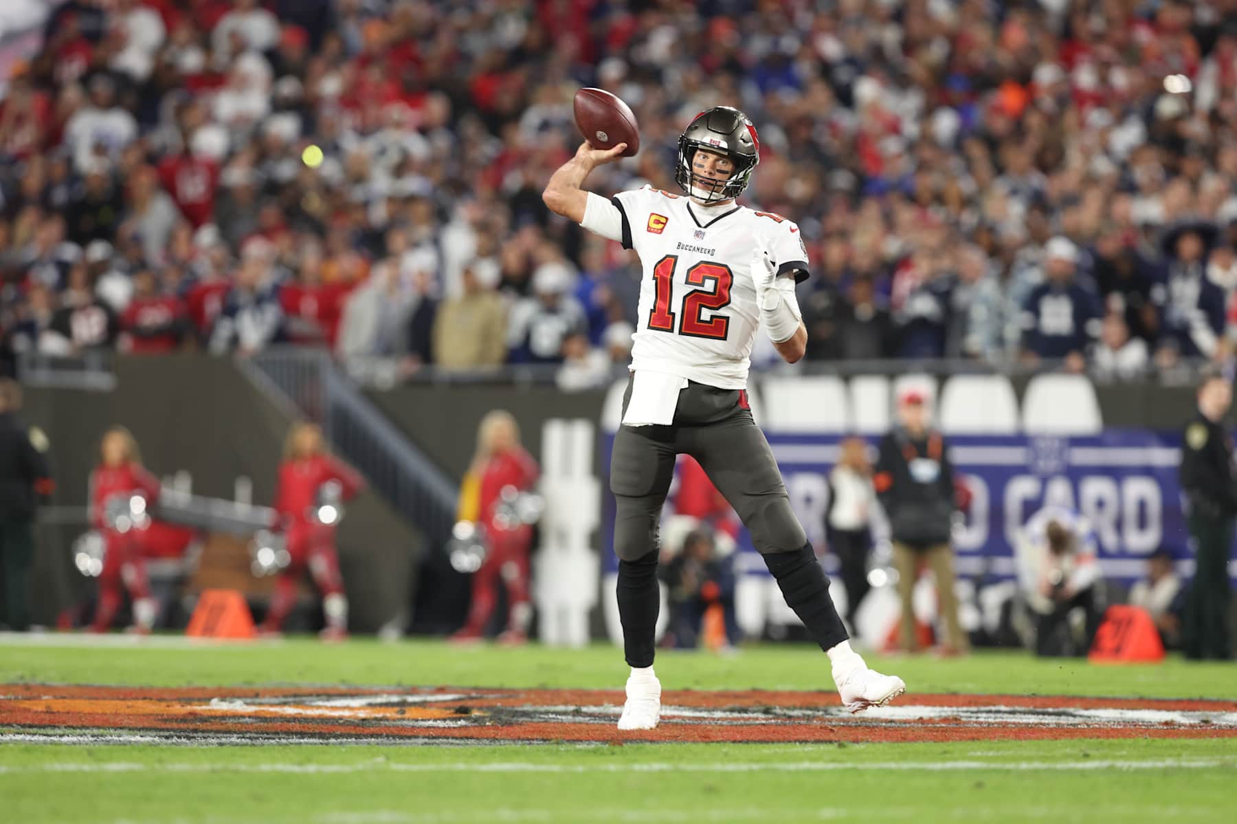 TAMPA, FLORIDA - JANUARY 16: Tom Brady  #12 of the Tampa Bay Buccaneers throws a pass against the Dallas Cowboys  during the  NFC Wild Card Playoff game at Raymond James Stadium on January 16, 2023 in Tampa, Florida. (Perry Knotts/Getty Images)