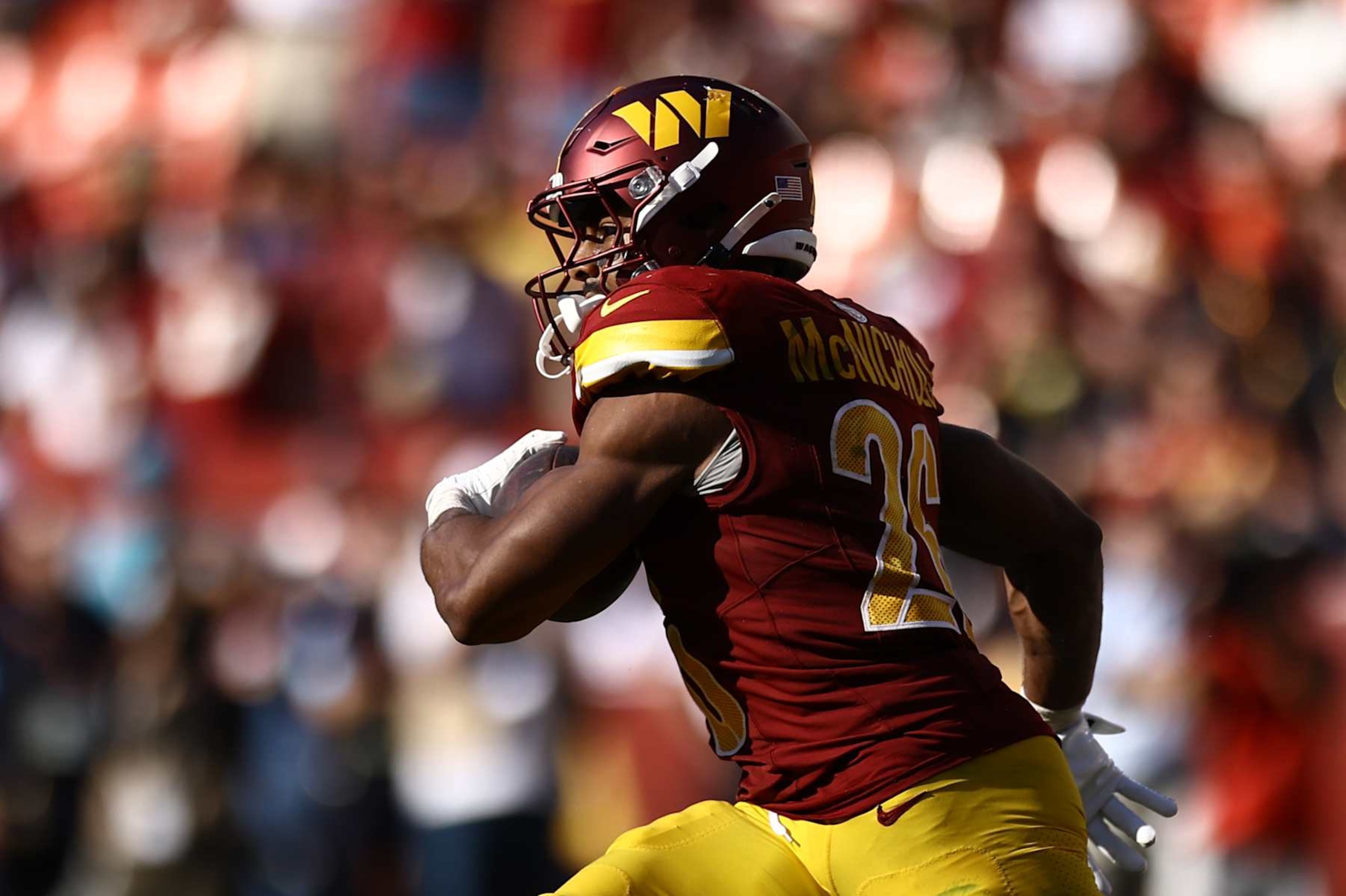 LANDOVER, MARYLAND - OCTOBER 06: Jeremy McNichols #26 of the Washington Commanders carries the ball against the Cleveland Browns at Northwest Stadium on October 06, 2024 in Landover, Maryland. (Photo by Timothy Nwachukwu/Getty Images)