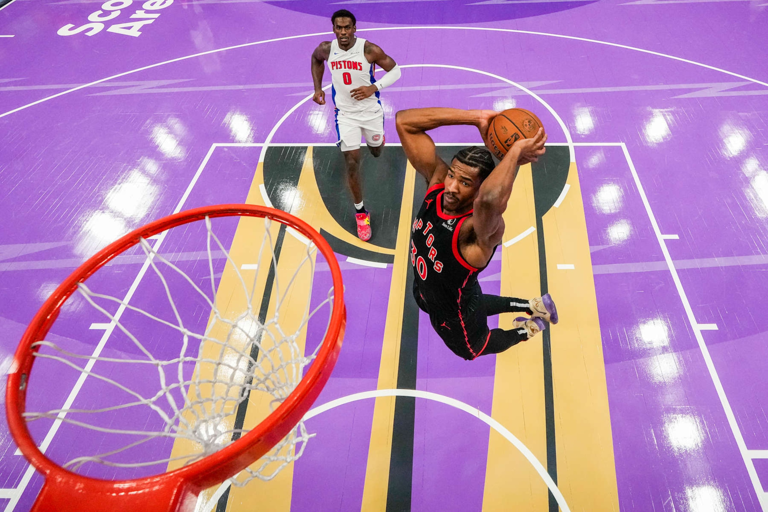 TORONTO, ON - NOVEMBER 15: Ochai Agbaji #30 of the Toronto Raptors dunks the ball against the Detroit Pistons during the Emirates NBA Cup game at Scotiabank Arena on November 15, 2024 in Toronto, Ontario, Canada. NOTE TO USER: User expressly acknowledges and agrees that, by downloading and/or using this Photograph, user is consenting to the terms and conditions of the Getty Images License Agreement. (Photo by Andrew Lahodynskyj/Getty Images) TORONTO, ON - NOVEMBER 15: Ochai Agbaji #30 of the Toronto Raptors dunks the ball against the Detroit Pistons during the Emirates NBA Cup game at Scotiabank Arena on November 15, 2024 in Toronto, Ontario, Canada. NOTE TO USER: User expressly acknowledges and agrees that, by downloading and/or using this Photograph, user is consenting to the terms and conditions of the Getty Images License Agreement. (Photo by Andrew Lahodynskyj/Getty Images)