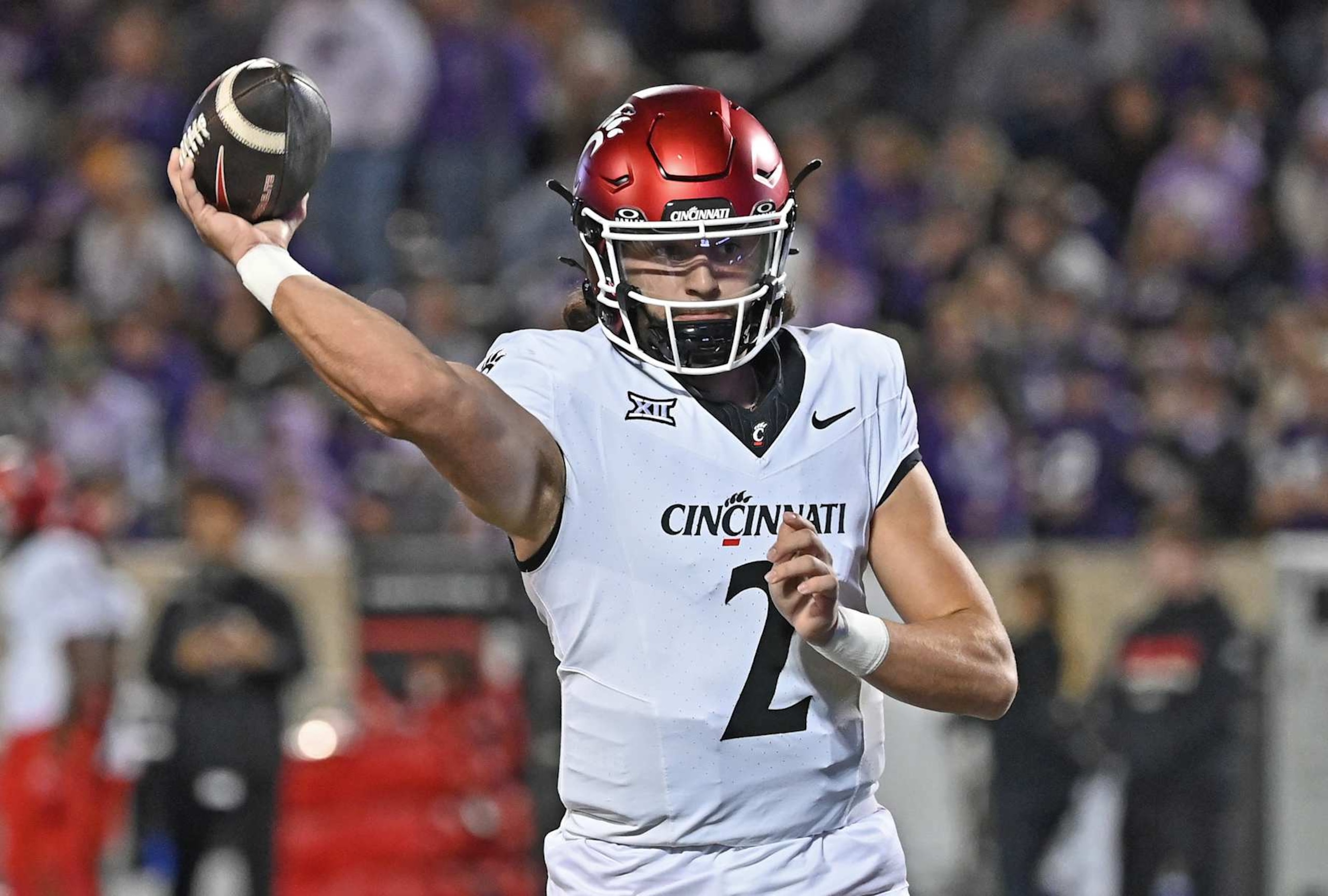MANHATTAN, KS - NOVEMBER 23: Quarterback Brendan Sorsby #2 of the Cincinnati Bearcats throws a pass during pre-game warm ups prior to a game against the Kansas State Wildcats at Bill Snyder Family Football Stadium on November 23, 2024 in Manhattan, Kansas. (Photo by Peter Aiken/Getty Images) MANHATTAN, KS - NOVEMBER 23: Quarterback Brendan Sorsby #2 of the Cincinnati Bearcats throws a pass during pre-game warm ups prior to a game against the Kansas State Wildcats at Bill Snyder Family Football Stadium on November 23, 2024 in Manhattan, Kansas. (Photo by Peter Aiken/Getty Images)