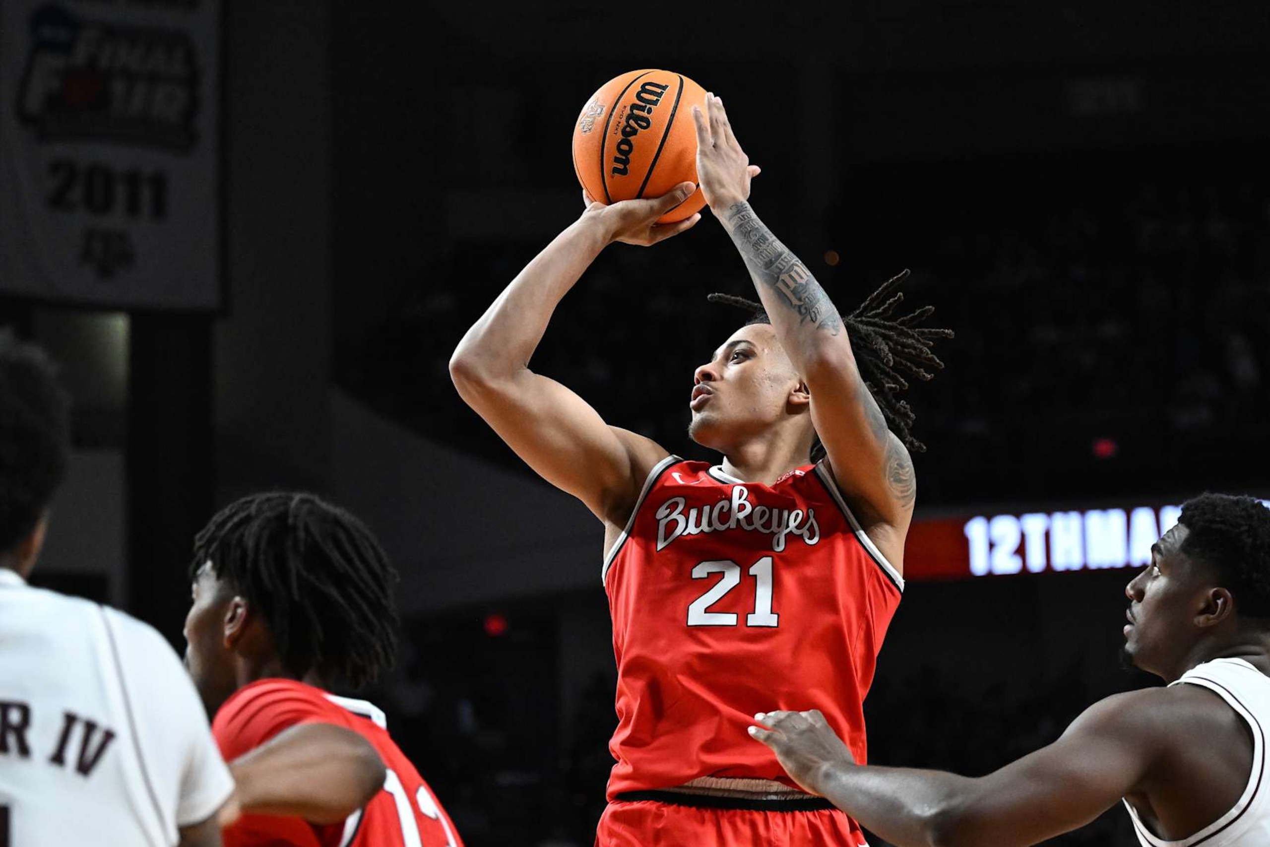 COLLEGE STATION, TEXAS - NOVEMBER 15: Devin Royal #21 of the Ohio State Buckeyes shoots at the basket against the Texas A&M Aggies during the second half at Reed Arena on November 15, 2024 in College Station, Texas. (Photo by Jack Gorman/Getty Images) COLLEGE STATION, TEXAS - NOVEMBER 15: Devin Royal #21 of the Ohio State Buckeyes shoots at the basket against the Texas A&M Aggies during the second half at Reed Arena on November 15, 2024 in College Station, Texas. (Photo by Jack Gorman/Getty Images)
