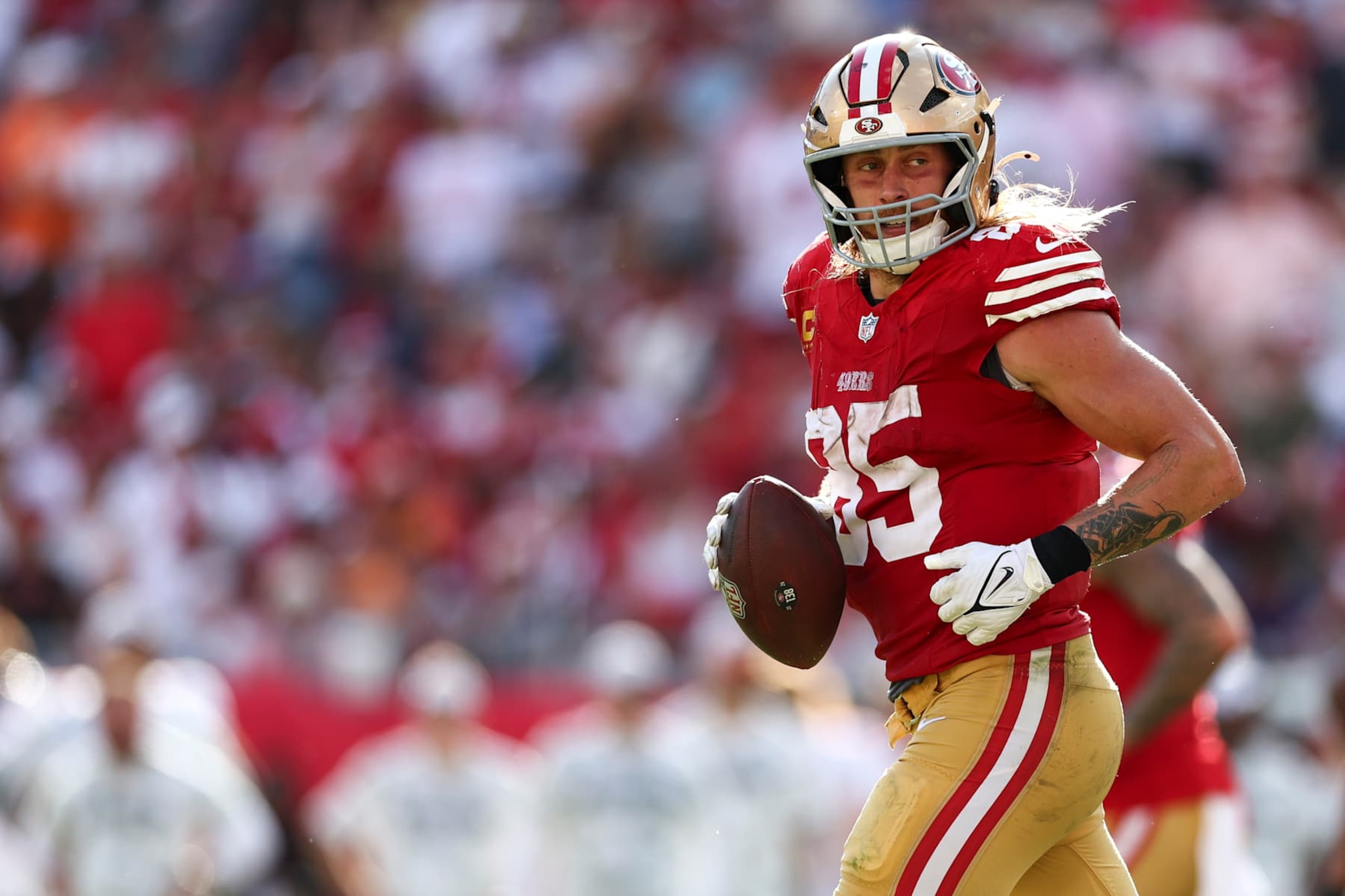 TAMPA, FLORIDA - NOVEMBER 10: George Kittle #85 of the San Francisco 49ers celebrates after scoring a touchdown during the second half of an NFL football game against the Tampa Bay Buccaneers at Raymond James Stadium on November 10, 2024 in Tampa, Florida. (Photo by Kevin Sabitus/Getty Images)