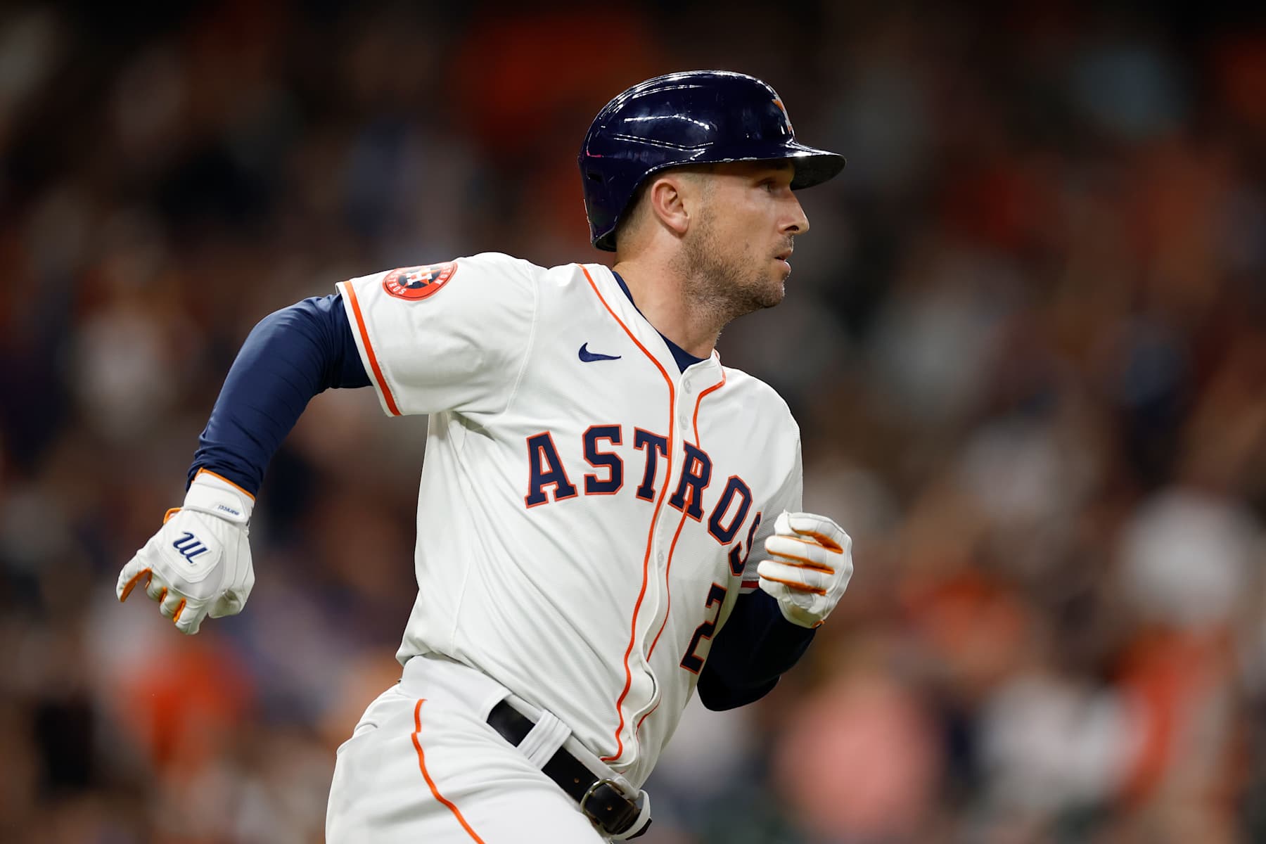 HOUSTON, TEXAS - SEPTEMBER 24: Alex Bregman #2 of the Houston Astros hits a home run in the first inning against the Seattle Mariners at Minute Maid Park on September 24, 2024 in Houston, Texas. (Photo by Tim Warner/Getty Images)