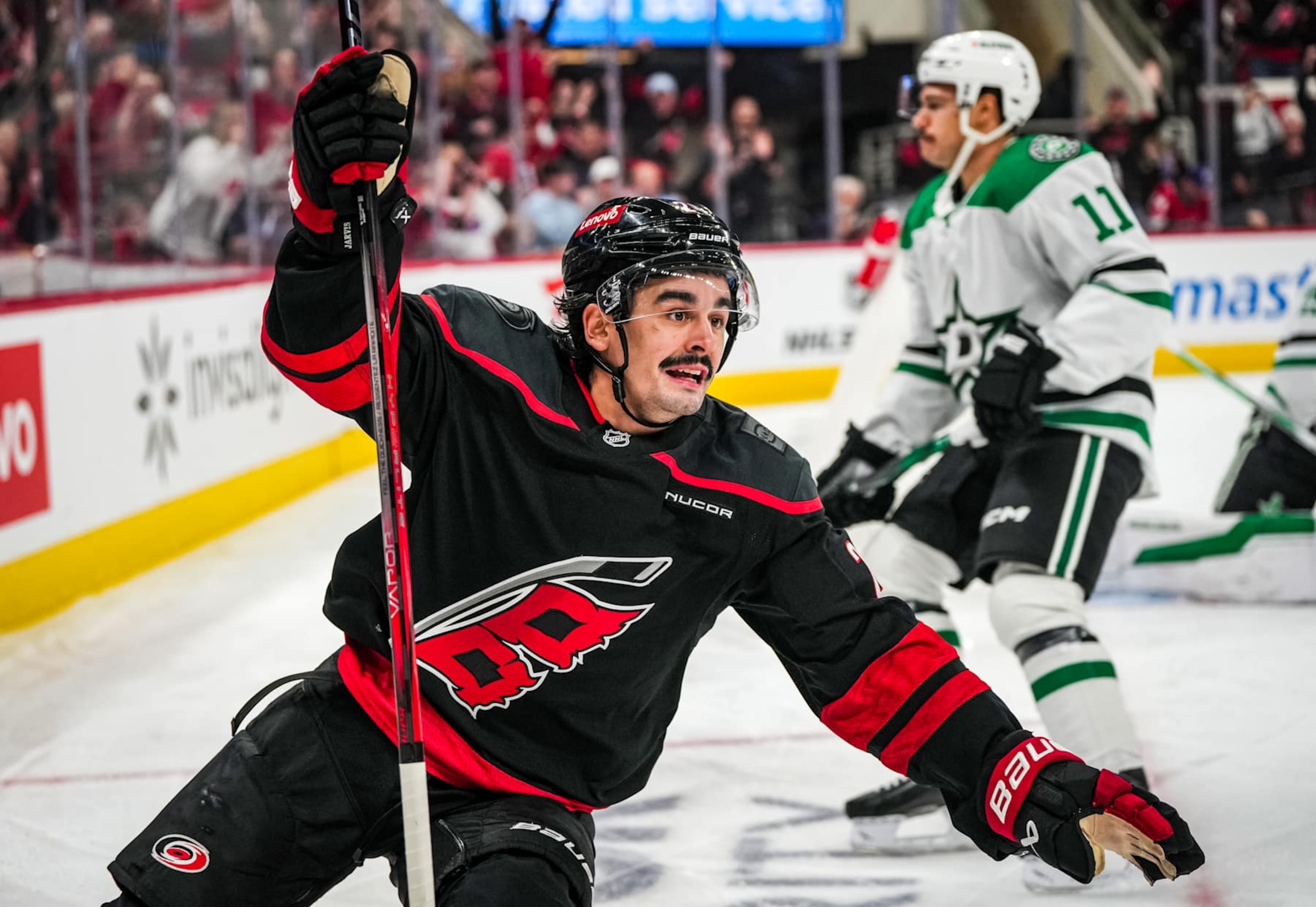 RALEIGH, NORTH CAROLINA - NOVEMBER 25:  Seth Jarvis #24 of the Carolina Hurricanes celebrates after a goal during the first period against the Dallas Stars at Lenovo Center on November 25, 2024 in Raleigh, North Carolina.  (Photo by Josh Lavallee/NHLI via Getty Images)