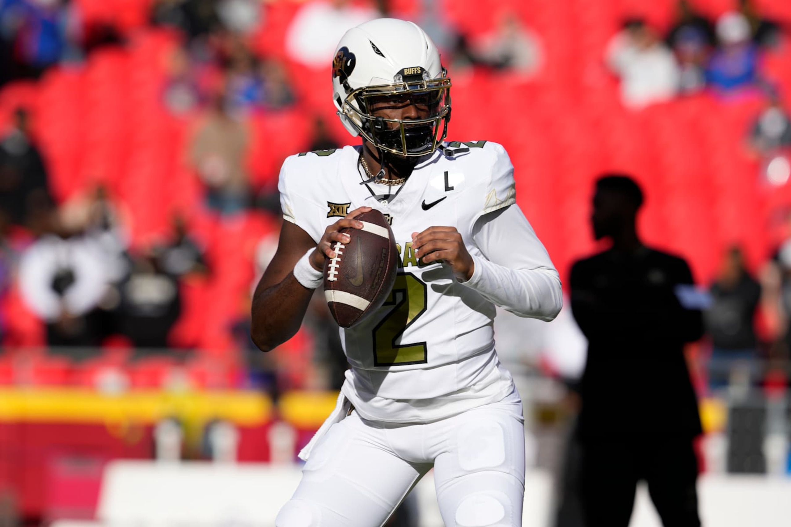 KANSAS CITY, MISSOURI - NOVEMBER 23:  Quarterback Shedeur Sanders #2 of the Colorado Buffaloes warms up prior to a game against the Kansas Jayhawks at Arrowhead Stadium on November 23, 2024 in Kansas City, Missouri.  (Photo by Ed Zurga/Getty Images)