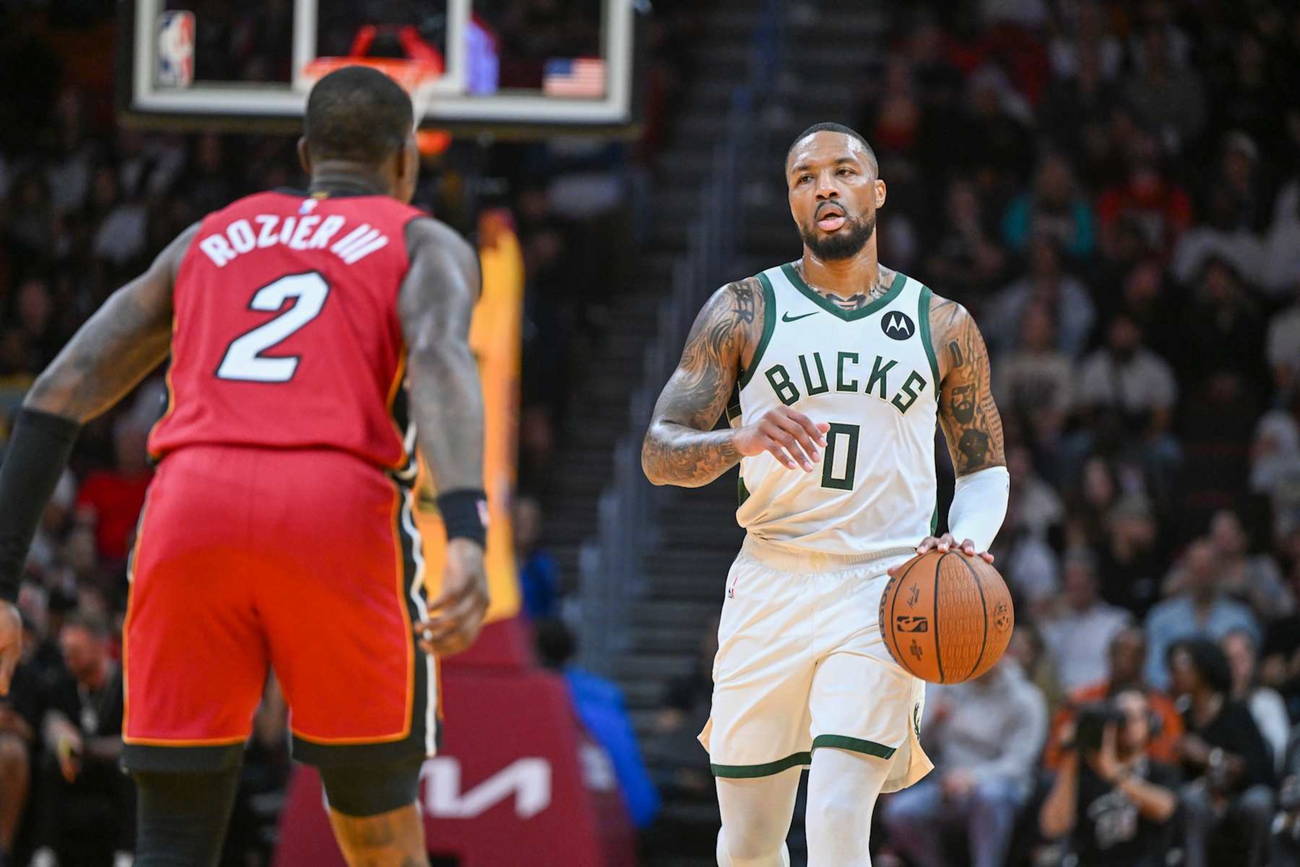 MIAMI, FL - NOVEMBER 26: Damian Lillard #0 of the Milwaukee Bucks dribbles the ball during the NBA Cup game against the Miami Heat on November 26, 2024 at Kaseya Center in Miami, Florida. NOTE TO USER: User expressly acknowledges and agrees that, by downloading and or using this Photograph, user is consenting to the terms and conditions of the Getty Images License Agreement. Mandatory Copyright Notice: Copyright 2024 NBAE (Photo by Chris Tilley/NBAE via Getty Images) MIAMI, FL - NOVEMBER 26: Damian Lillard #0 of the Milwaukee Bucks dribbles the ball during the NBA Cup game against the Miami Heat on November 26, 2024 at Kaseya Center in Miami, Florida. NOTE TO USER: User expressly acknowledges and agrees that, by downloading and or using this Photograph, user is consenting to the terms and conditions of the Getty Images License Agreement. Mandatory Copyright Notice: Copyright 2024 NBAE (Photo by Chris Tilley/NBAE via Getty Images)