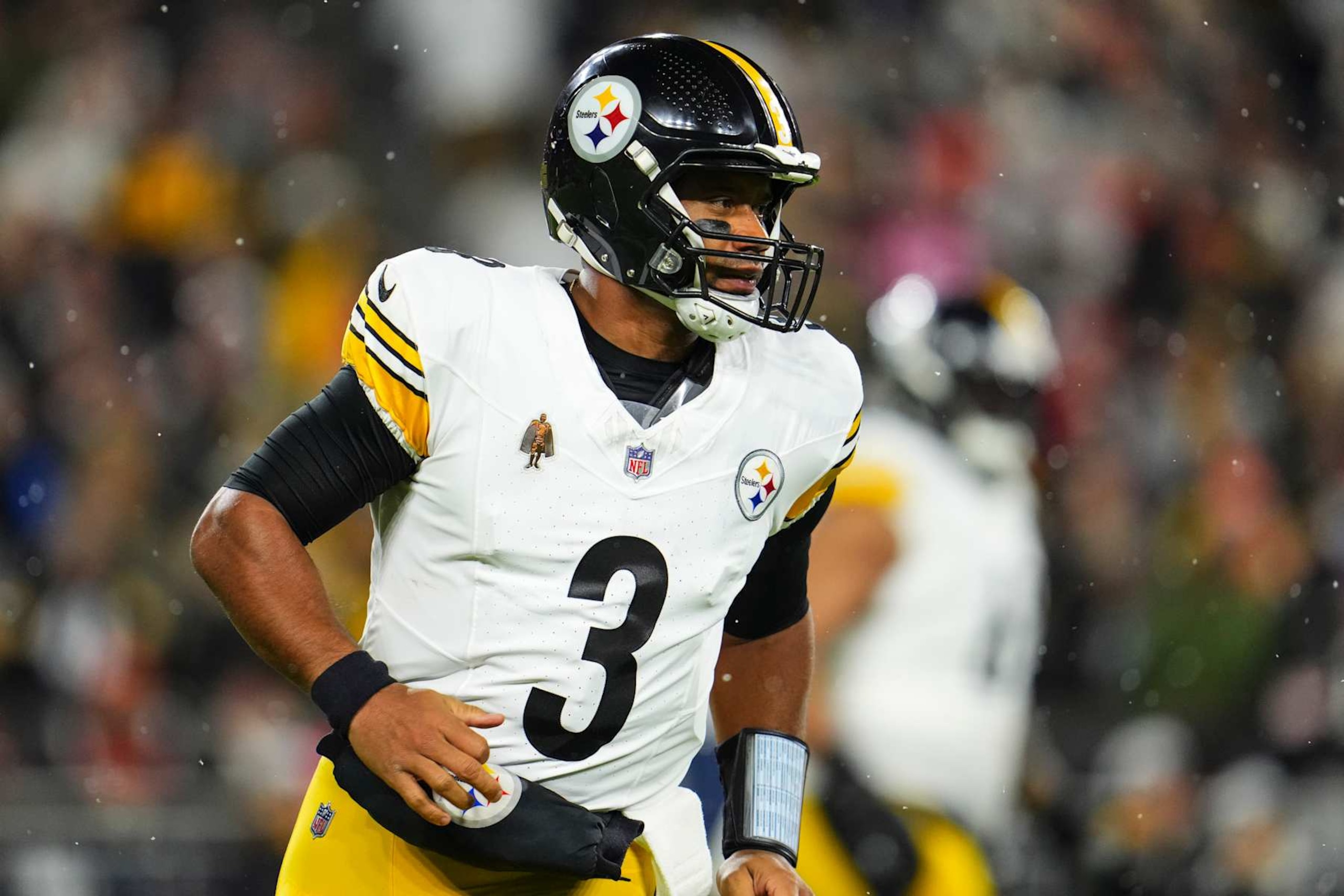 CLEVELAND, OH - NOVEMBER 21: Russell Wilson #3 of the Pittsburgh Steelers looks on from the field during an NFL football game against the Cleveland Browns at Huntington Bank Field on November 21, 2024 in Cleveland, Ohio. (Photo by Cooper Neill/Getty Images)