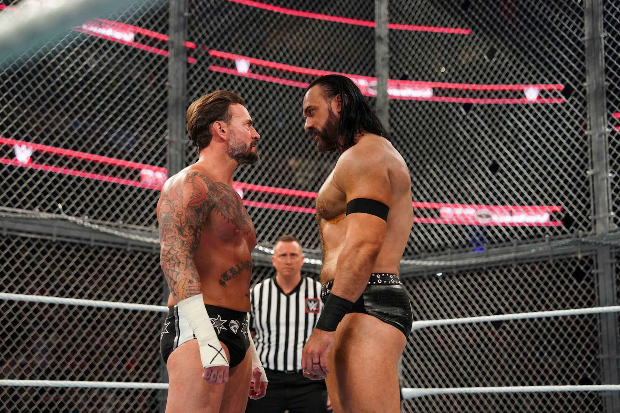 ATLANTA, GEORGIA - OCTOBER 5: CM Punk and Drew McIntyre face off during Bad Blood at State Farm Arena on October 5, 2024 in Atlanta, Georgia.  (Photo by WWE/Getty Images)