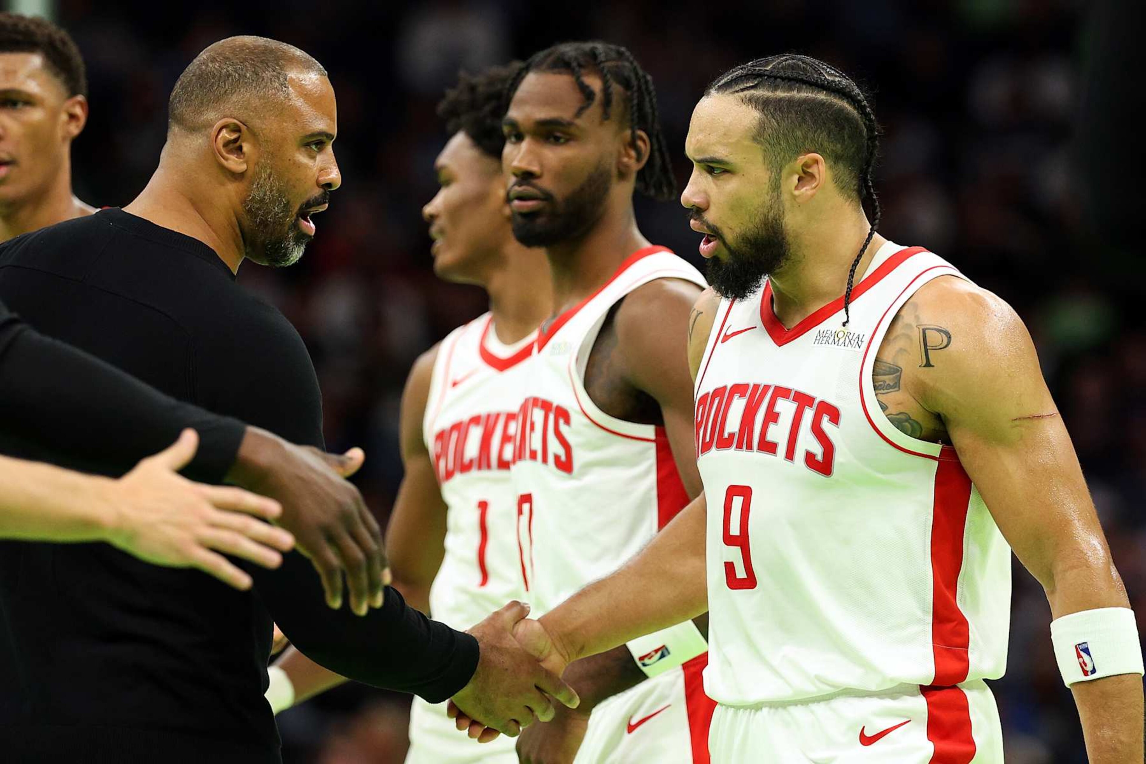 MINNEAPOLIS, MINNESOTA - NOVEMBER 26: Head coach Ime Udoka interacts with Dillon Brooks #9 of the Houston Rockets in the third quarter against the Minnesota Timberwolves during the Emirates NBA Cup at Target Center on November 26, 2024 in Minneapolis, Minnesota. The Rockets defeated the Timberwolves 117-111 in overtime. NOTE TO USER: User expressly acknowledges and agrees that, by downloading and or using this photograph, User is consenting to the terms and conditions of the Getty Images License Agreement. (Photo by David Berding/Getty Images) MINNEAPOLIS, MINNESOTA - NOVEMBER 26: Head coach Ime Udoka interacts with Dillon Brooks #9 of the Houston Rockets in the third quarter against the Minnesota Timberwolves during the Emirates NBA Cup at Target Center on November 26, 2024 in Minneapolis, Minnesota. The Rockets defeated the Timberwolves 117-111 in overtime. NOTE TO USER: User expressly acknowledges and agrees that, by downloading and or using this photograph, User is consenting to the terms and conditions of the Getty Images License Agreement. (Photo by David Berding/Getty Images)