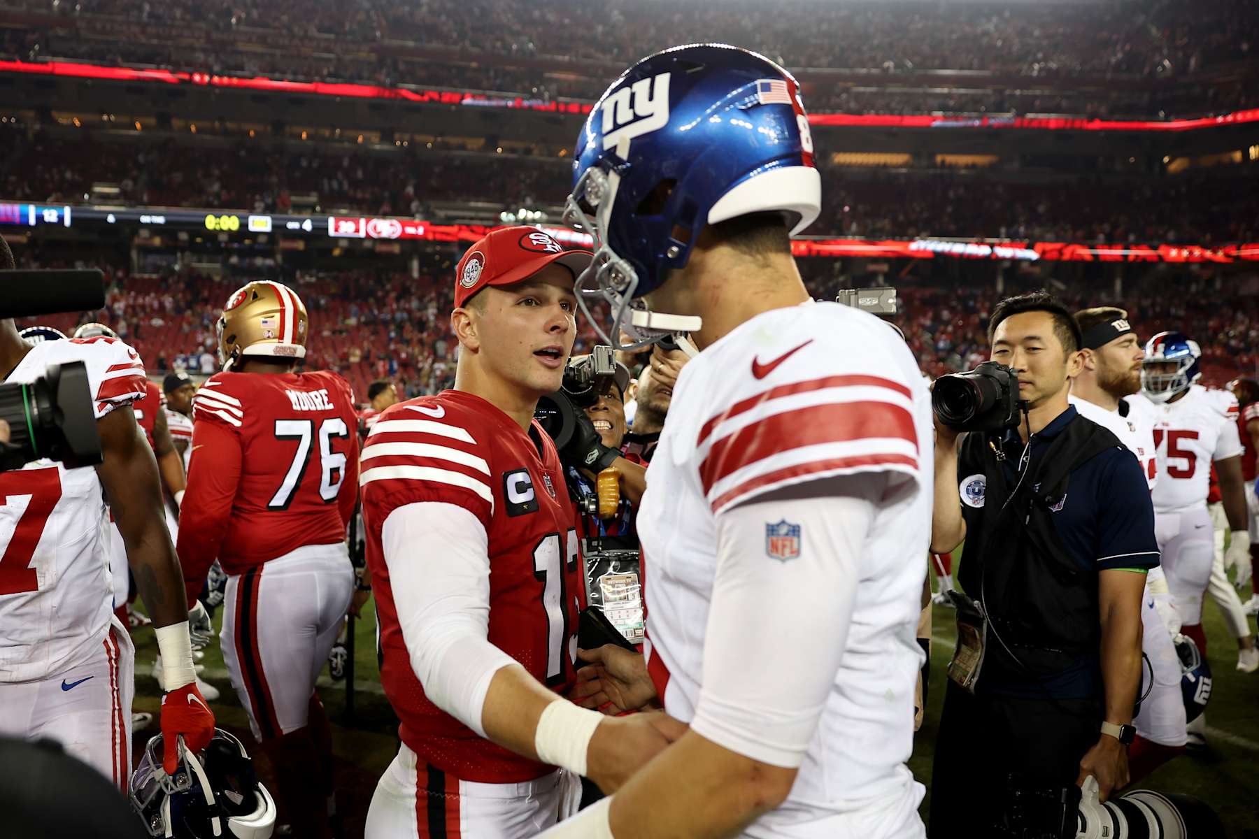 SANTA CLARA, CALIFORNIA - SEPTEMBER 21: Daniel Jones #8 of the New York Giants congratulates Brock Purdy #13 of the San Francisco 49ers after the game at Levi's Stadium on September 21, 2023 in Santa Clara, California. (Photo by Ezra Shaw/Getty Images)