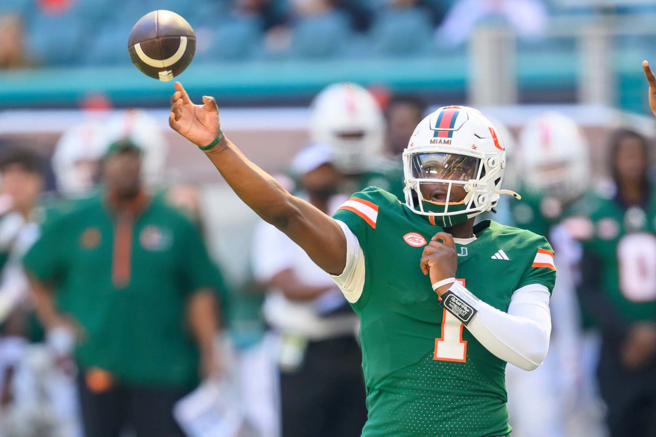 MIAMI GARDENS, FL - NOVEMBER 23: Miami quarterback Cam Ward (1) throws the ball during the college football game between the Wake Forest Deacon Demons and the University of Miami Hurricanes on November 23, 2024 at the Hard Rock Stadium in Miami Gardens, FL. (Photo by Doug Murray/Icon Sportswire via Getty Images) MIAMI GARDENS, FL - NOVEMBER 23: Miami quarterback Cam Ward (1) throws the ball during the college football game between the Wake Forest Deacon Demons and the University of Miami Hurricanes on November 23, 2024 at the Hard Rock Stadium in Miami Gardens, FL. (Photo by Doug Murray/Icon Sportswire via Getty Images)