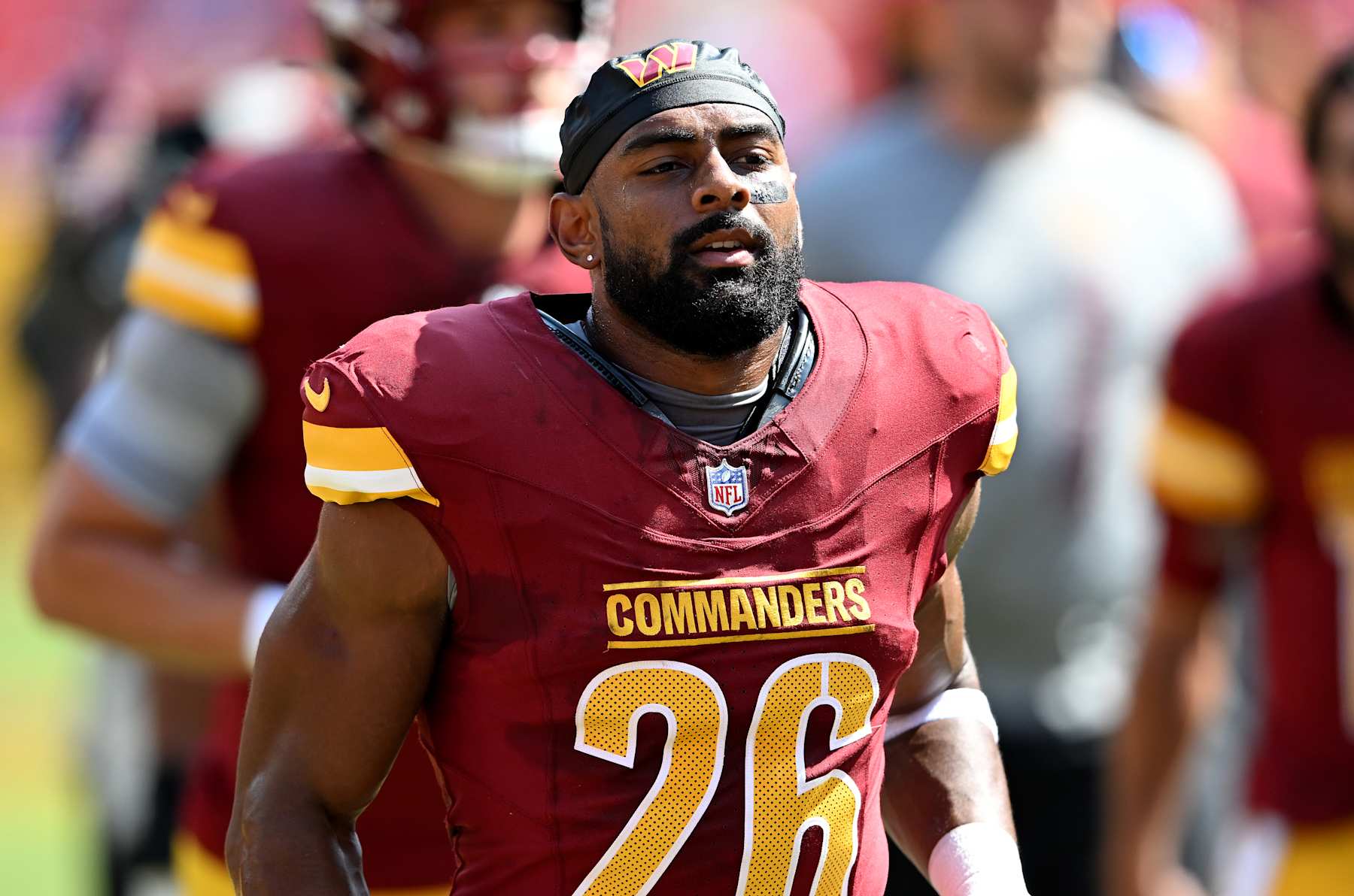 LANDOVER, MARYLAND - SEPTEMBER 15: Jeremy McNichols #26 of the Washington Commanders warms up before the game against the New York Giants at Northwest Stadium on September 15, 2024 in Landover, Maryland.  (Photo by G Fiume/Getty Images)