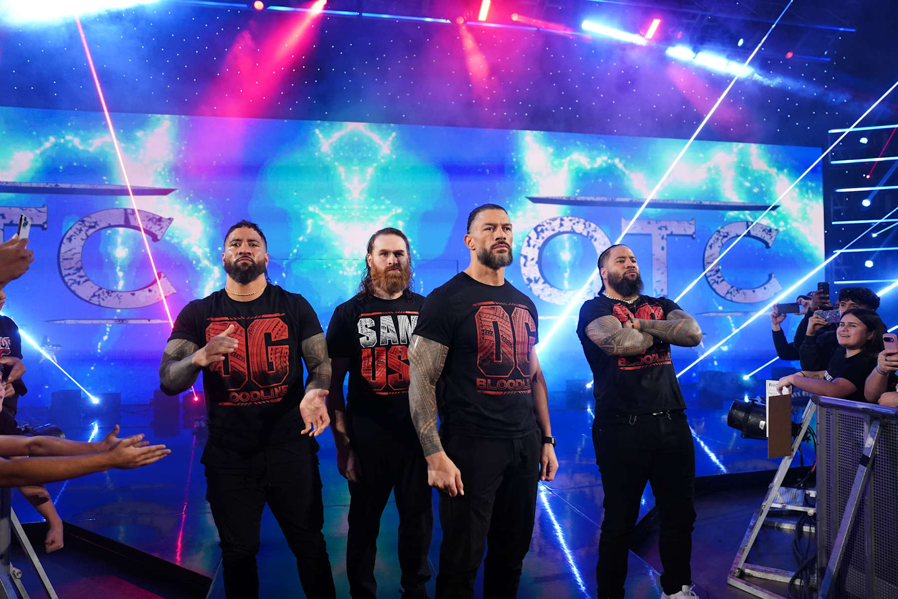 SALT LAKE CITY, UTAH - NOVEMBER 22: Jey Uso, Sami Zayn, Roman Reigns, and Jimmy Uso entrance during WWE SmackDown at Delta Center on November 22, 2024 in Salt Lake City, Utah.  (Photo by WWE/Getty Images)